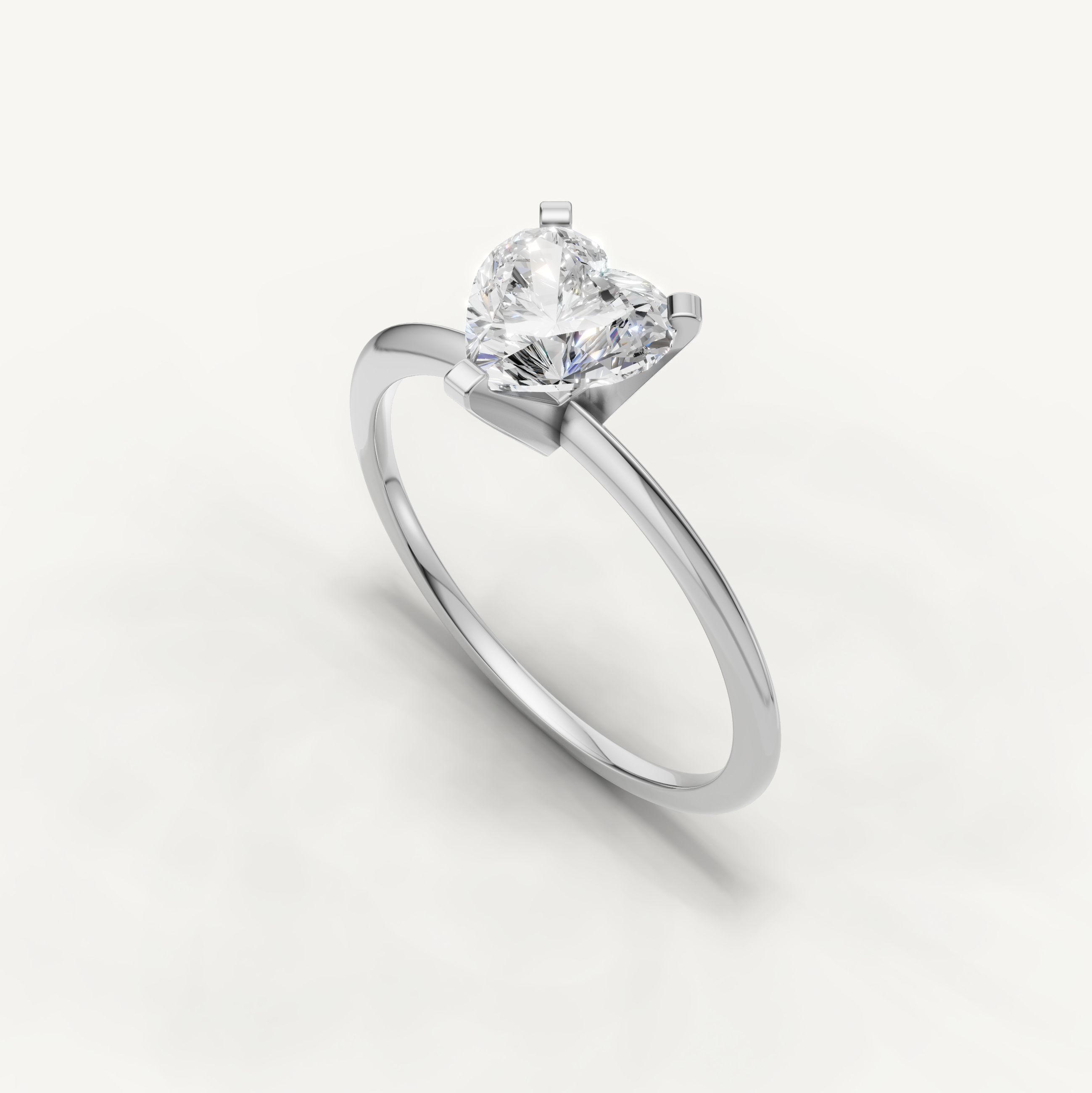 Minimal white gold heart cut solitaire ring with lab grown diamond by Raul Diamonds
