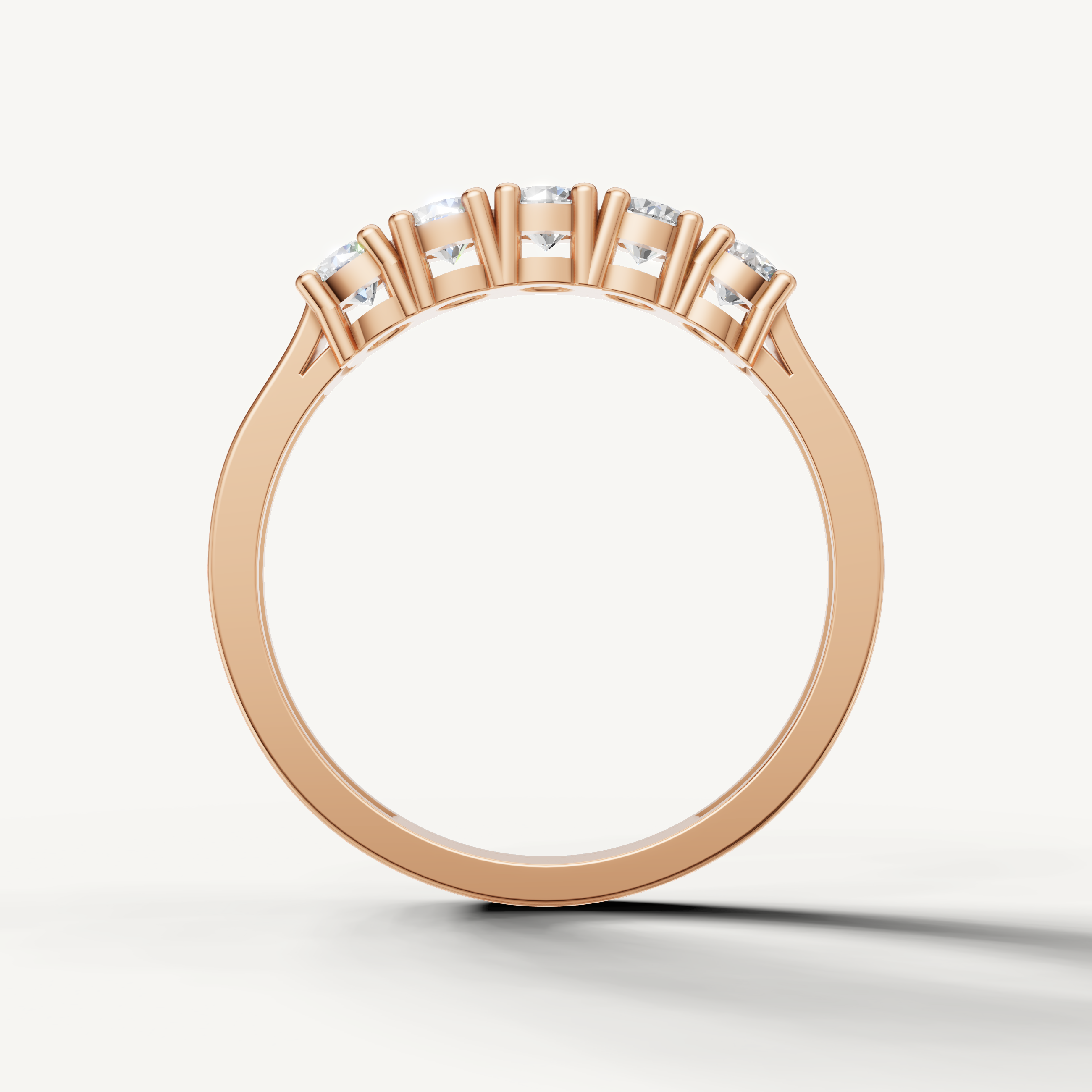 Modern rose gold diamond wedding ring with timeless prong setting