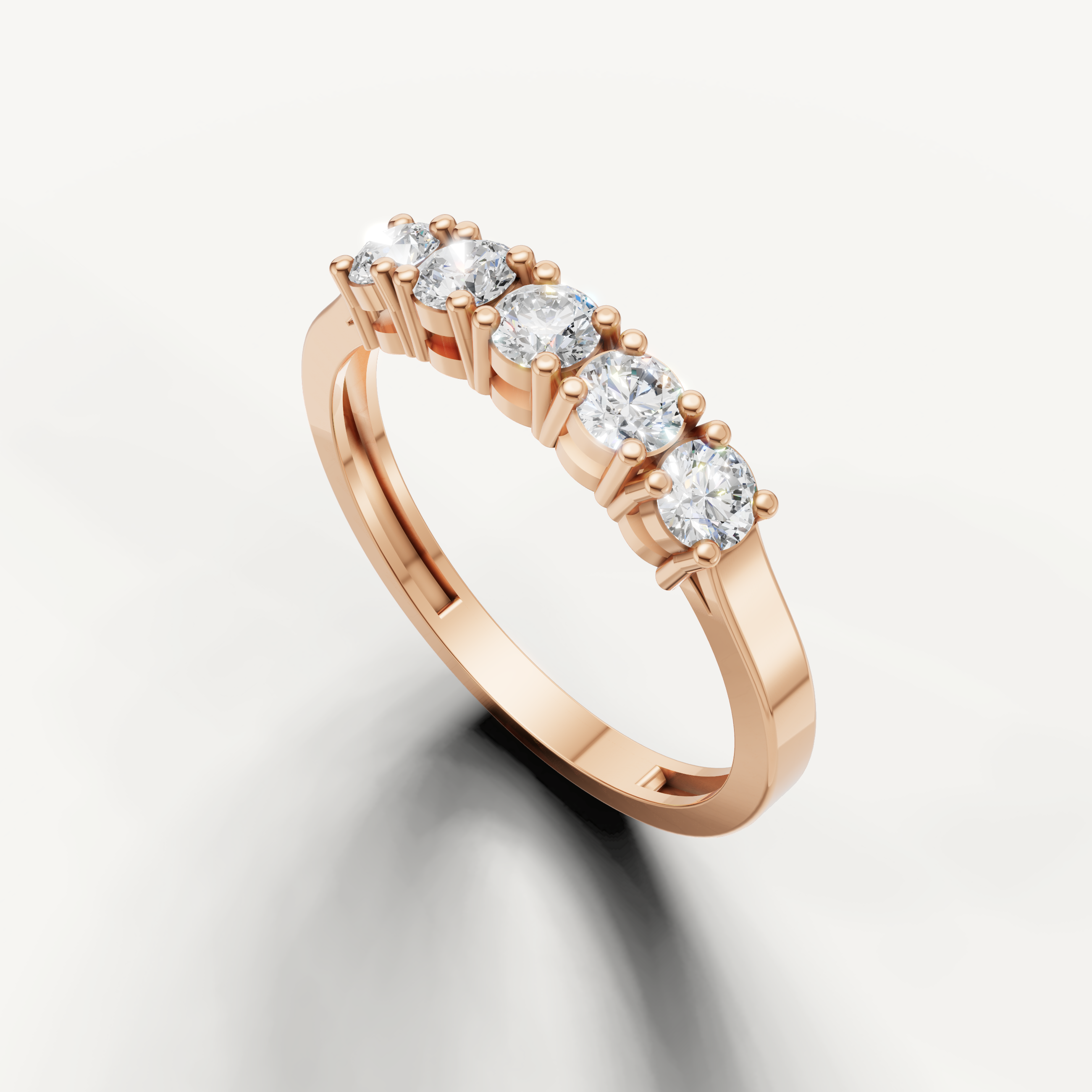 Luxury rose gold wedding band with five round brilliant cut diamonds