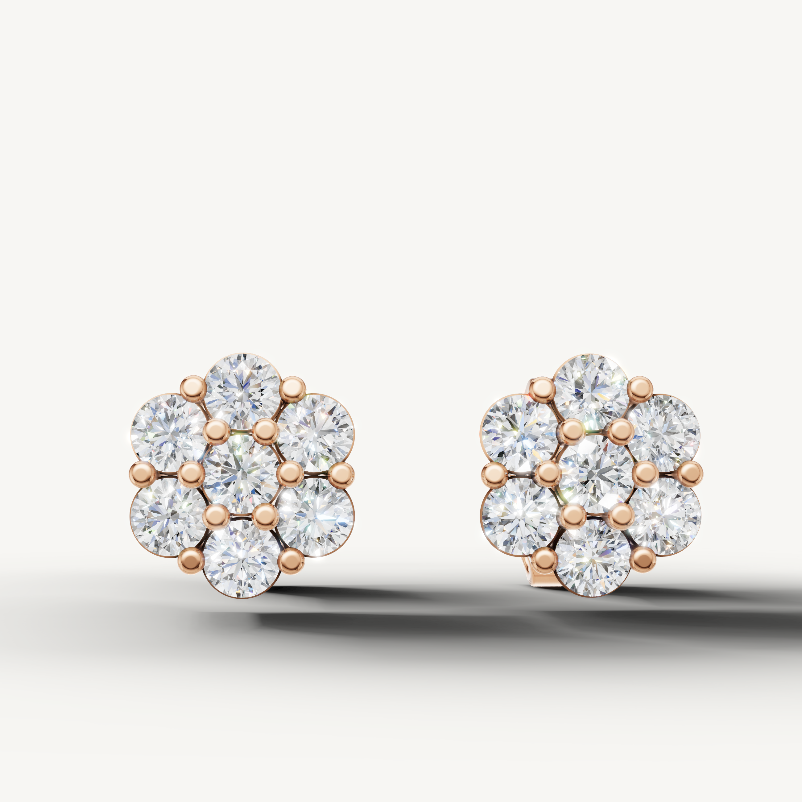 Raul Diamonds rose gold floral diamond stud earrings with round cut diamonds