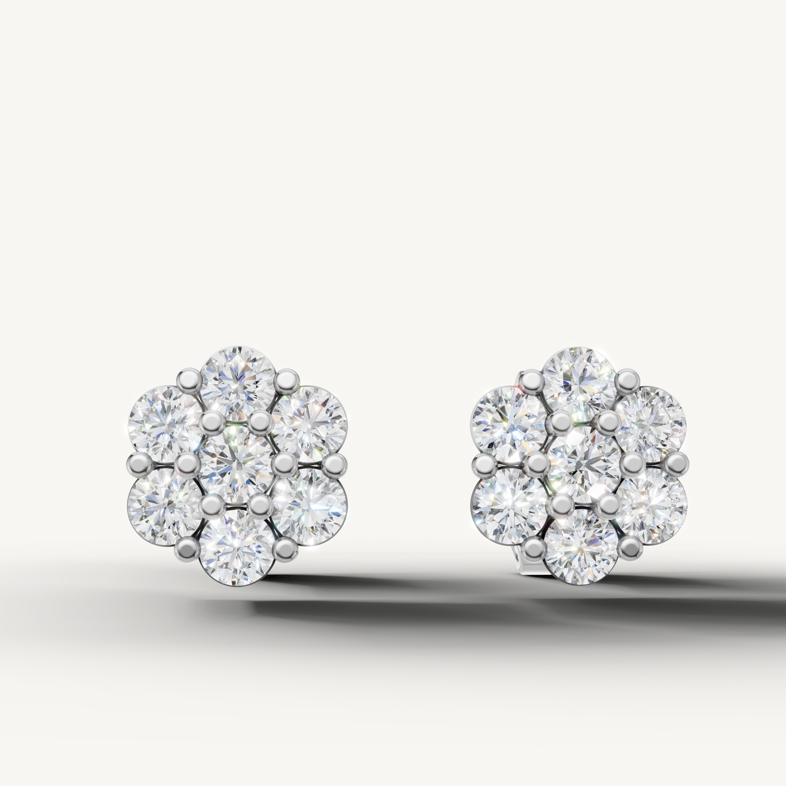 Raul Diamonds white gold floral diamond stud earrings with round brilliant diamonds