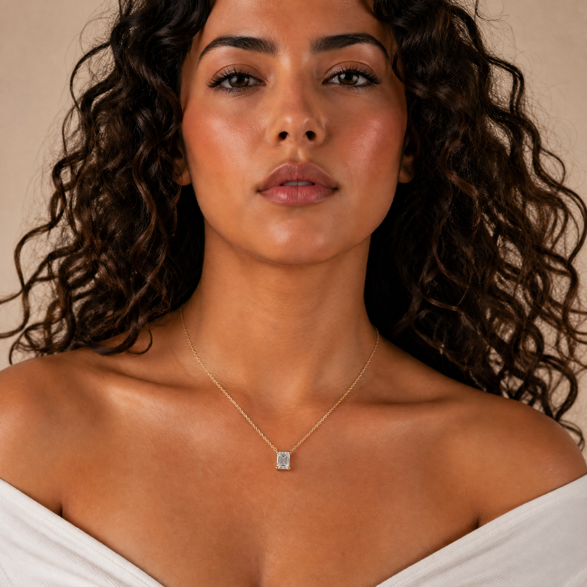 Female Model Wearing Emerald Cut Lab Grown Diamond Pendant Necklace in 14K Gold by Raul Diamonds