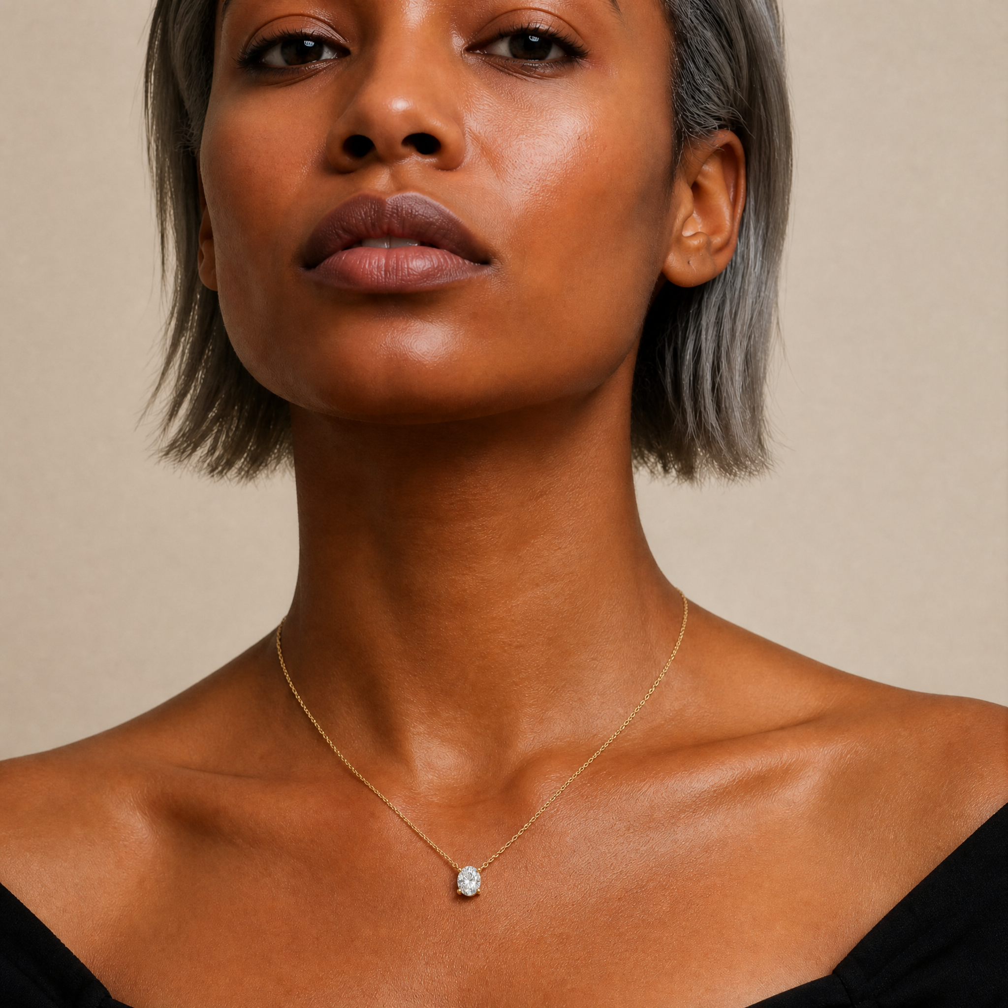 Female Model Wearing Oval Cut Lab Grown Diamond Bezel Pendant Necklace in 14K Gold by Raul Diamonds
