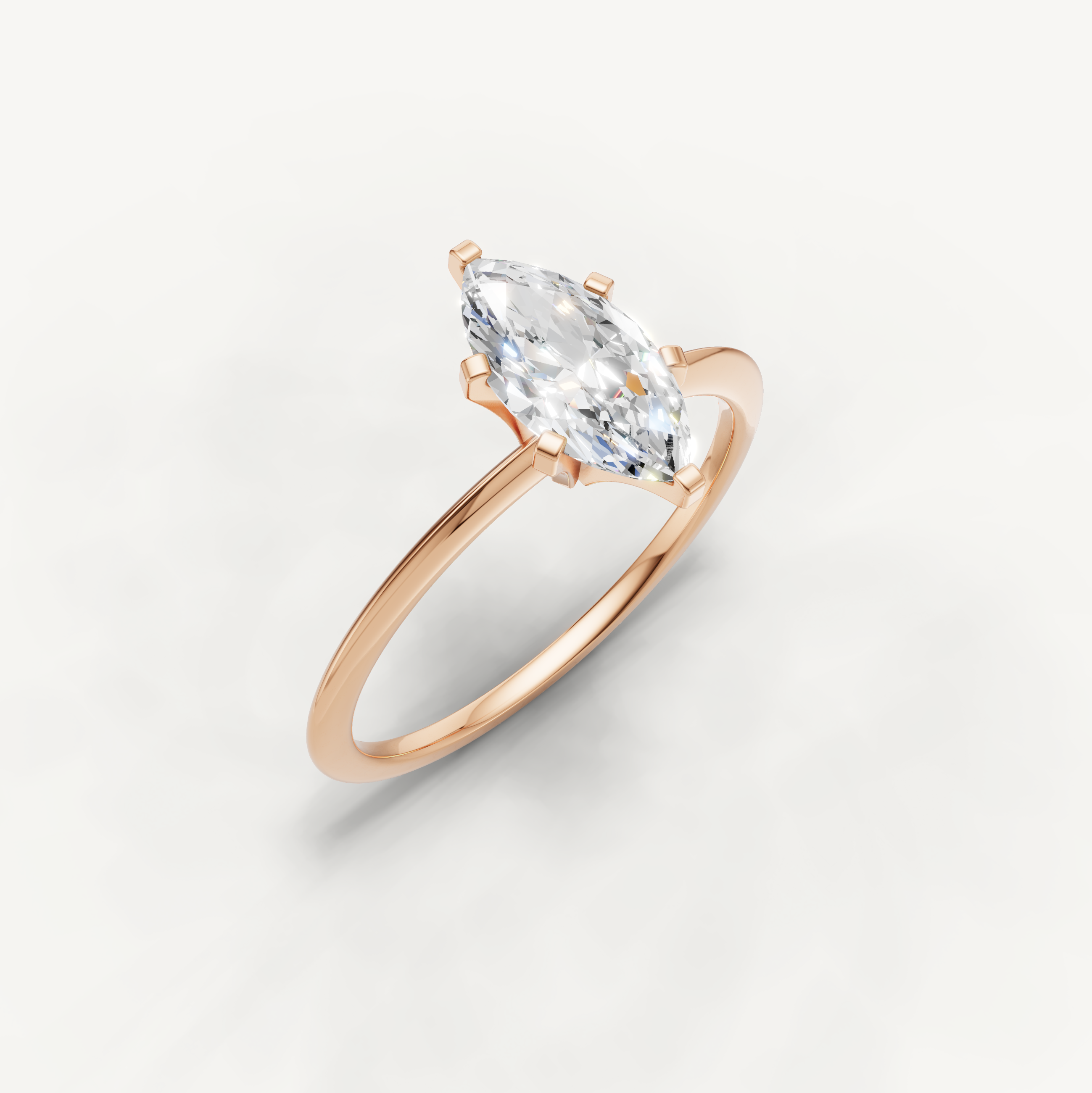 Romantic rose gold marquise diamond engagement ring for modern brides by Raul Diamonds