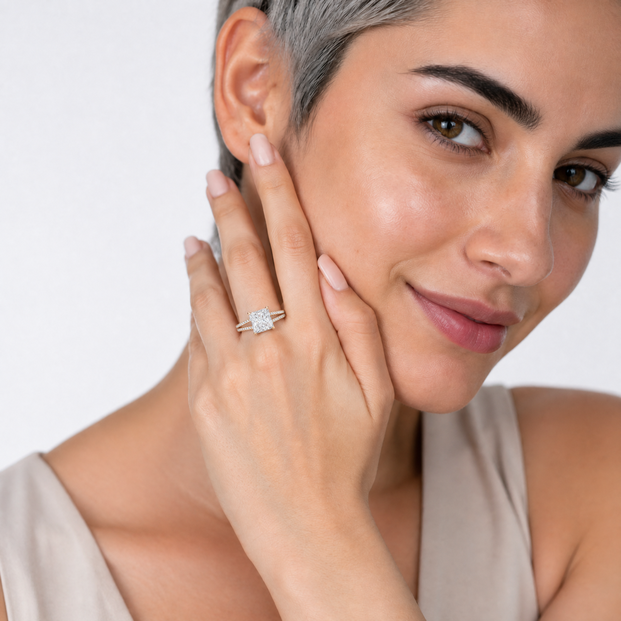 Woman Wearing Princess Cut Lab Grown Diamond Engagement Ring in 14K Yellow Gold – Raul Diamonds