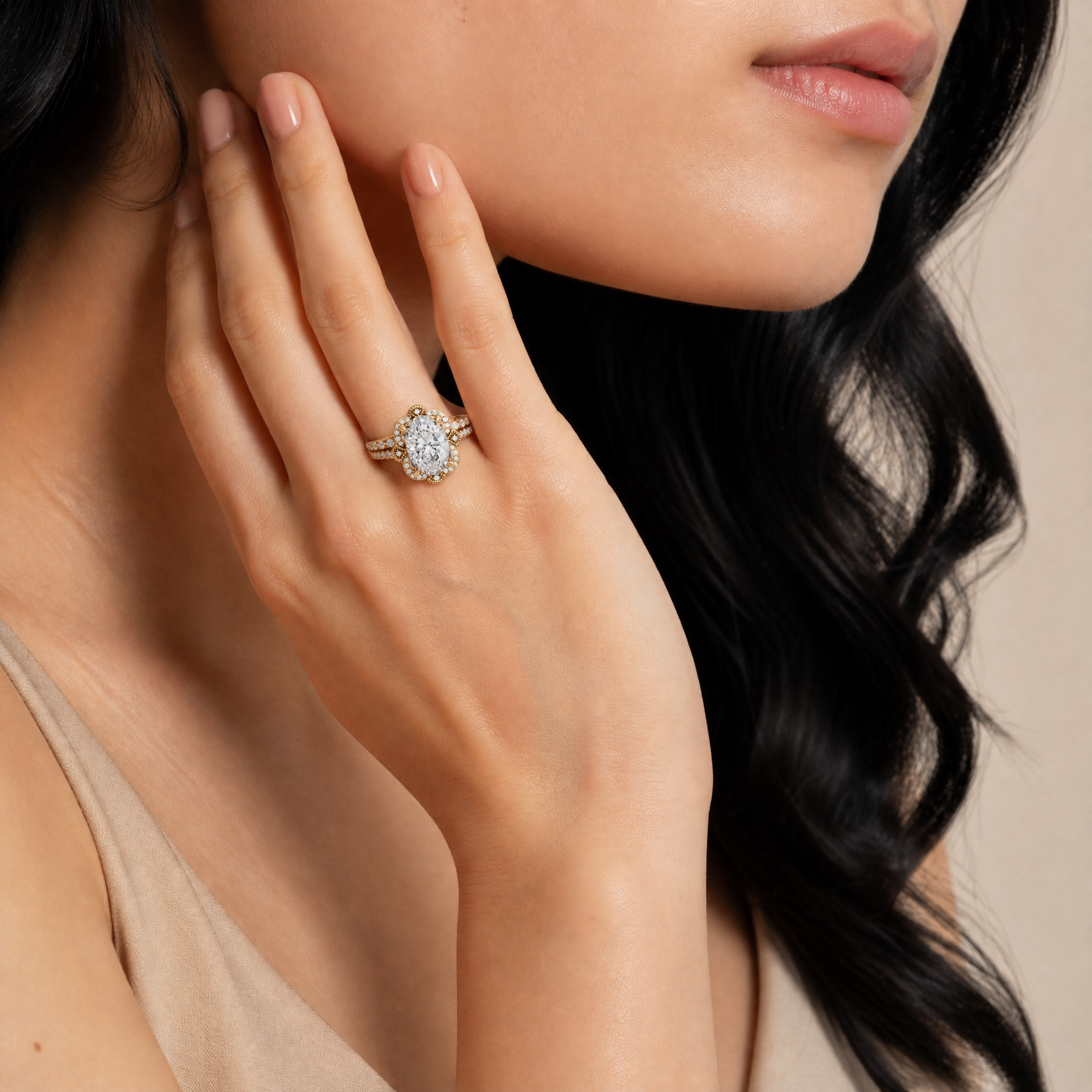 Female Model Wearing Oval Cut Lab Grown Diamond Floral Halo Bridal Set by Raul Diamonds
