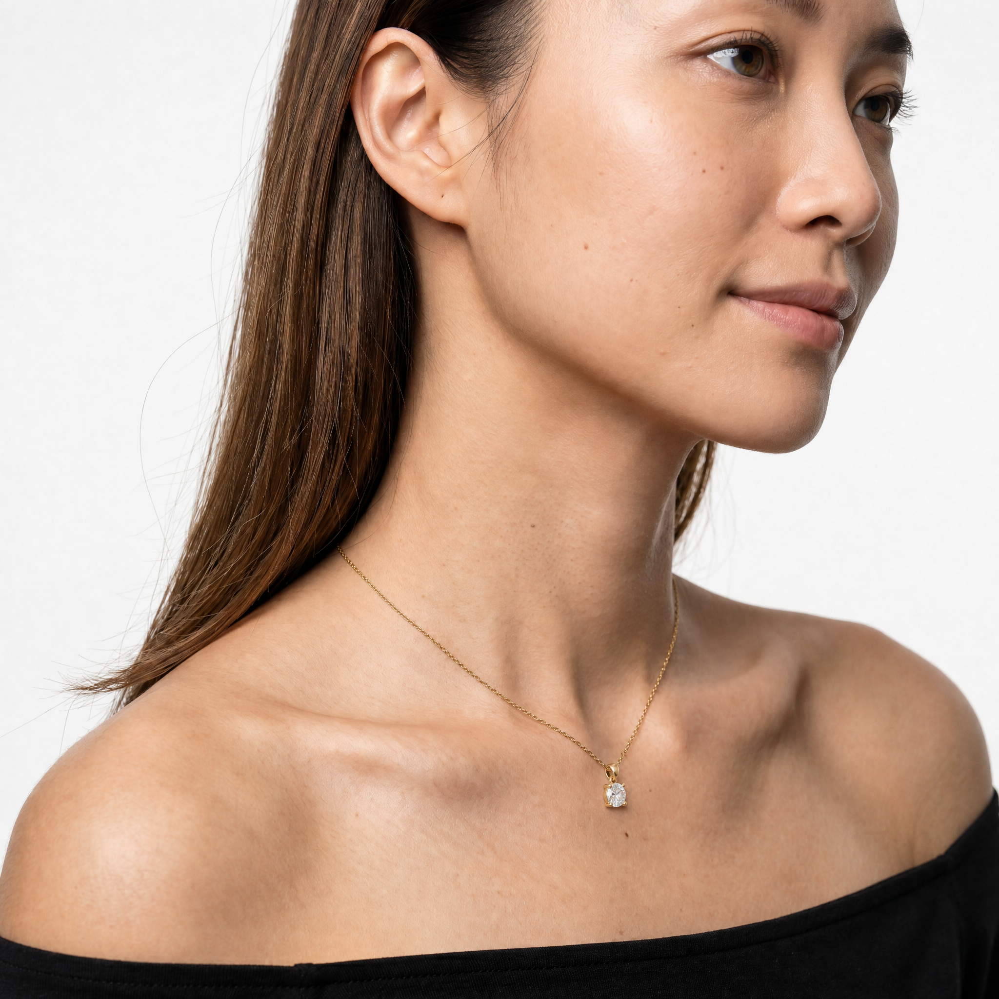 Female Model Wearing Round Brilliant Lab Grown Diamond Solitaire Pendant Necklace in 14K Gold by Raul Diamonds