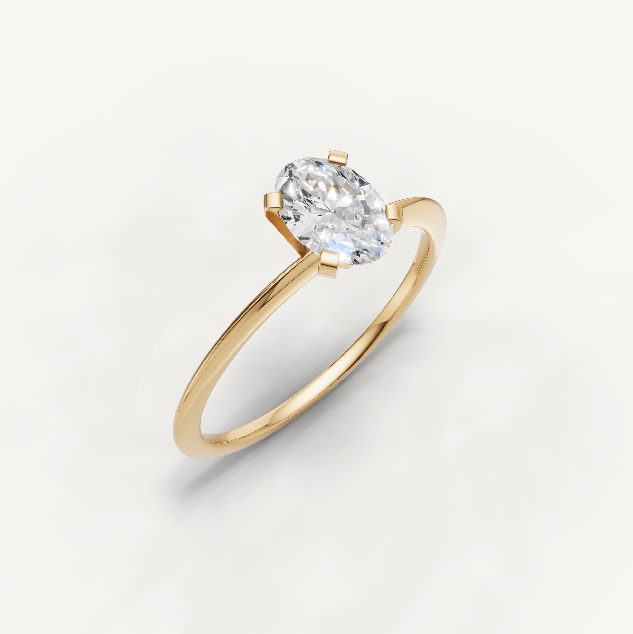 Elegant oval diamond yellow gold solitaire ring for women by Raul Diamonds