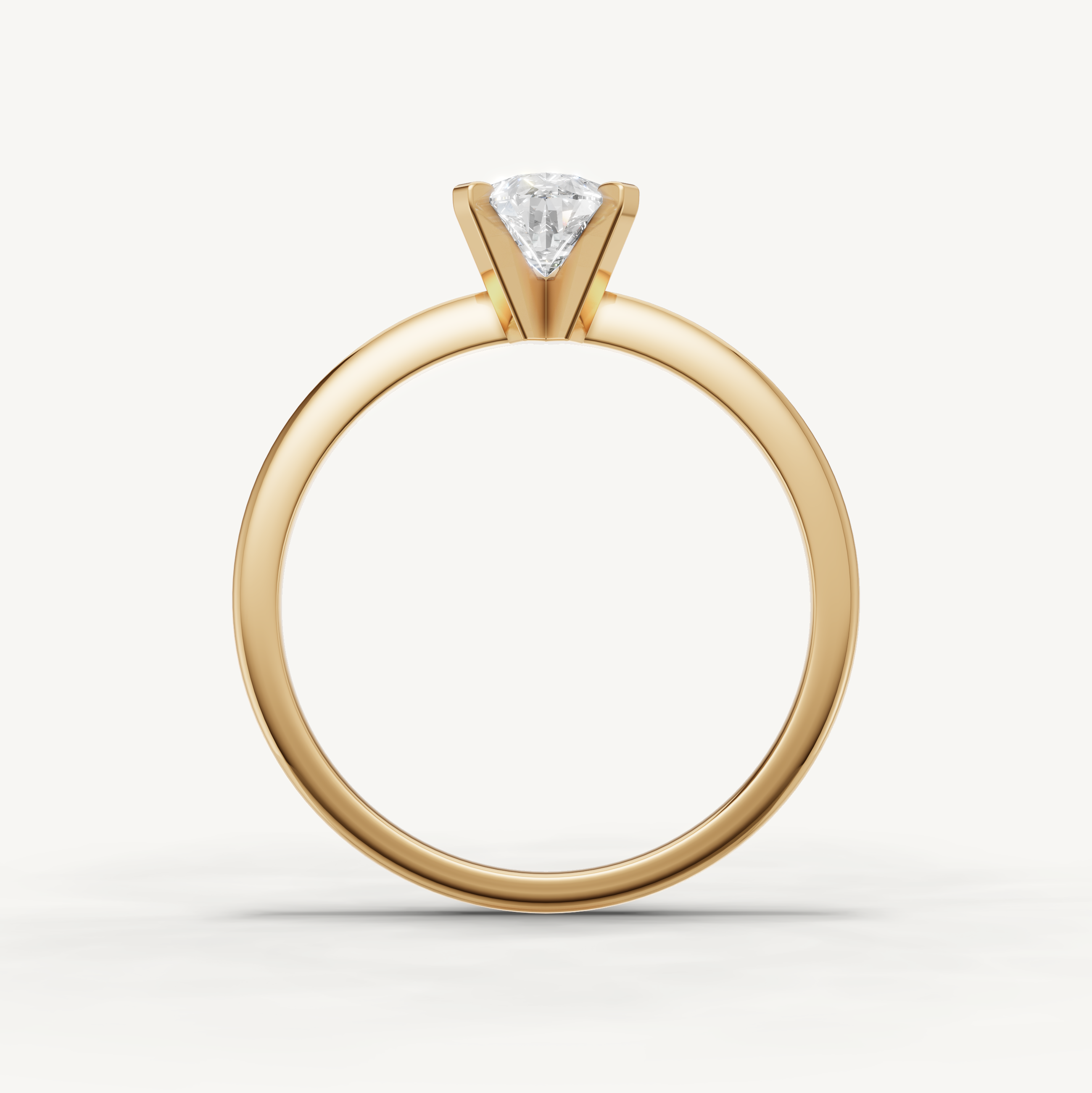 Classic pear cut diamond ring in polished yellow gold by Raul Diamonds