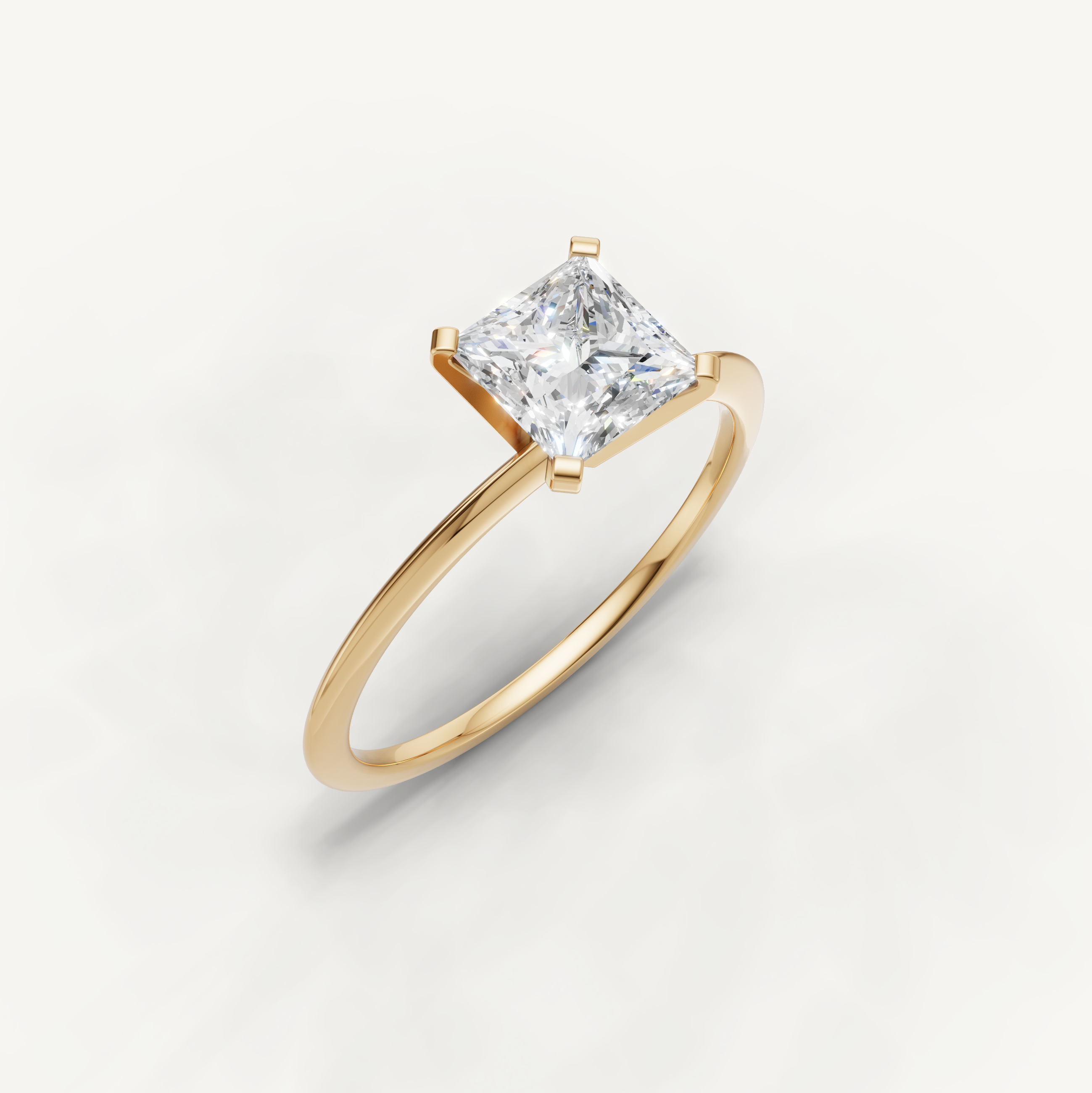 Elegant princess cut yellow gold solitaire ring for women by Raul Diamonds