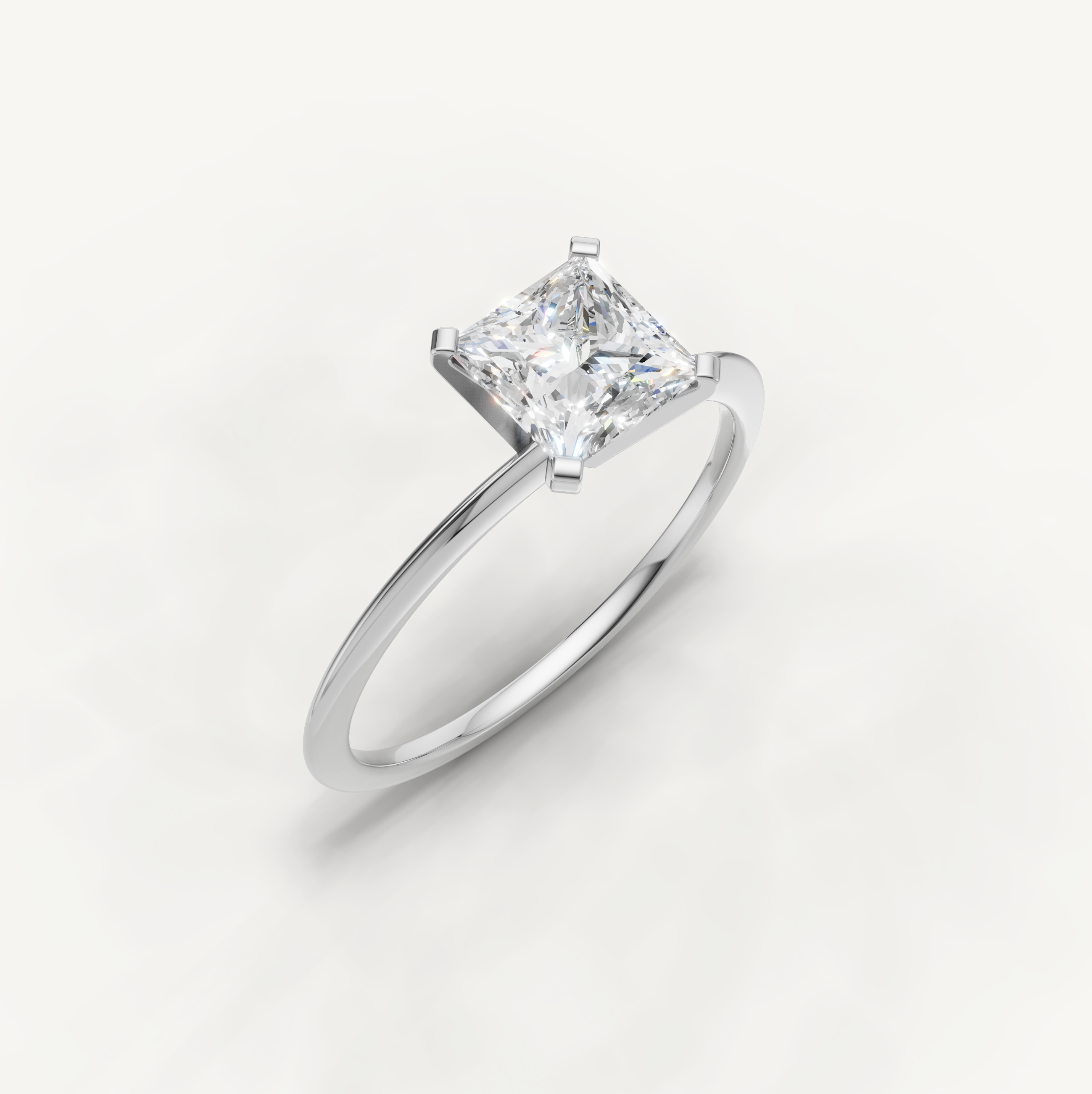 Timeless white gold princess cut diamond solitaire ring by Raul Diamonds