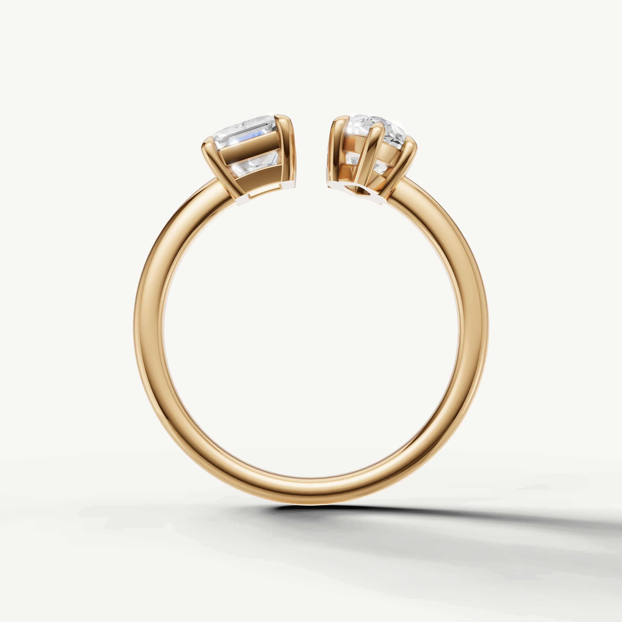 Handmade yellow gold toi et moi diamond ring with modern dual stone setting by Raul Diamonds