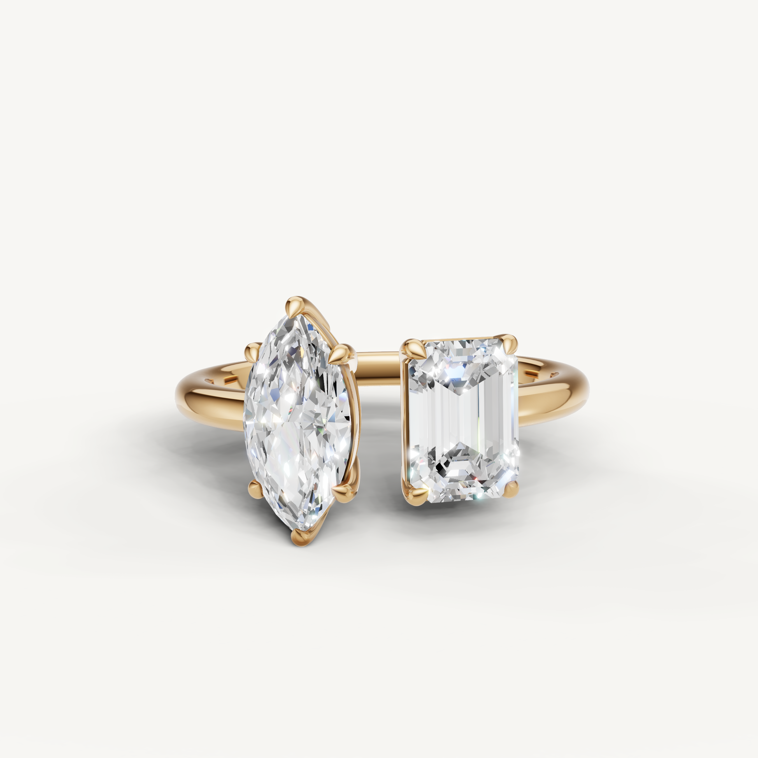 Raul Diamonds toi et moi engagement ring in yellow gold with marquise and emerald cut diamonds