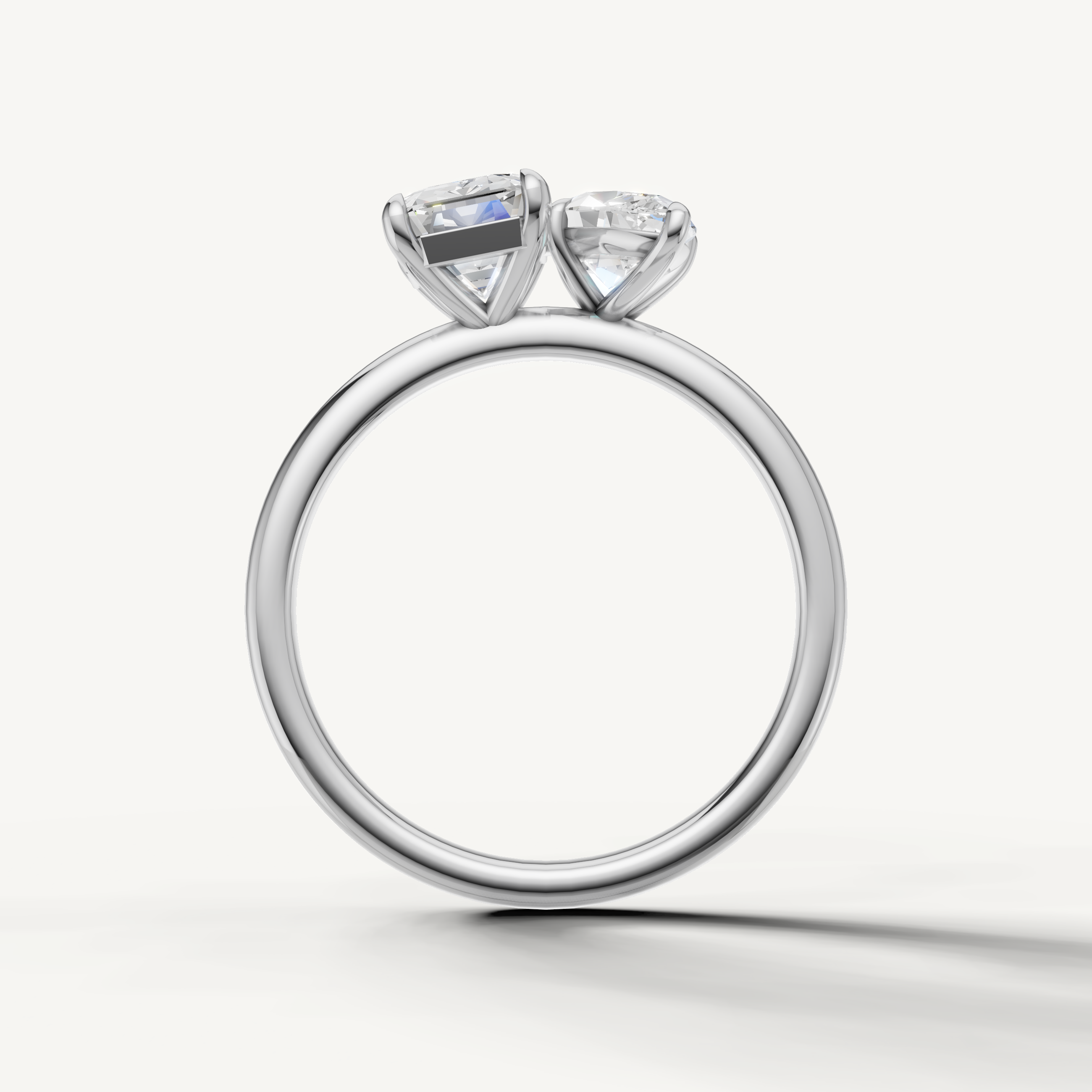 Modern white gold toi et moi ring crafted with marquise and emerald cut lab diamonds by Raul Diamonds
