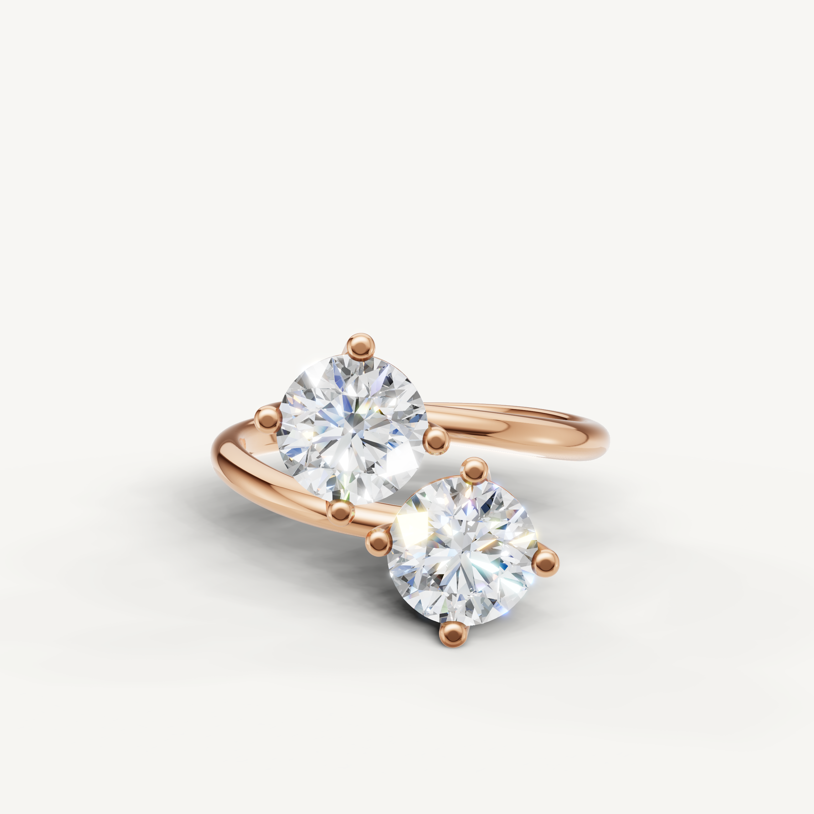 Raul Diamonds rose gold bypass ring with dual round cut diamonds