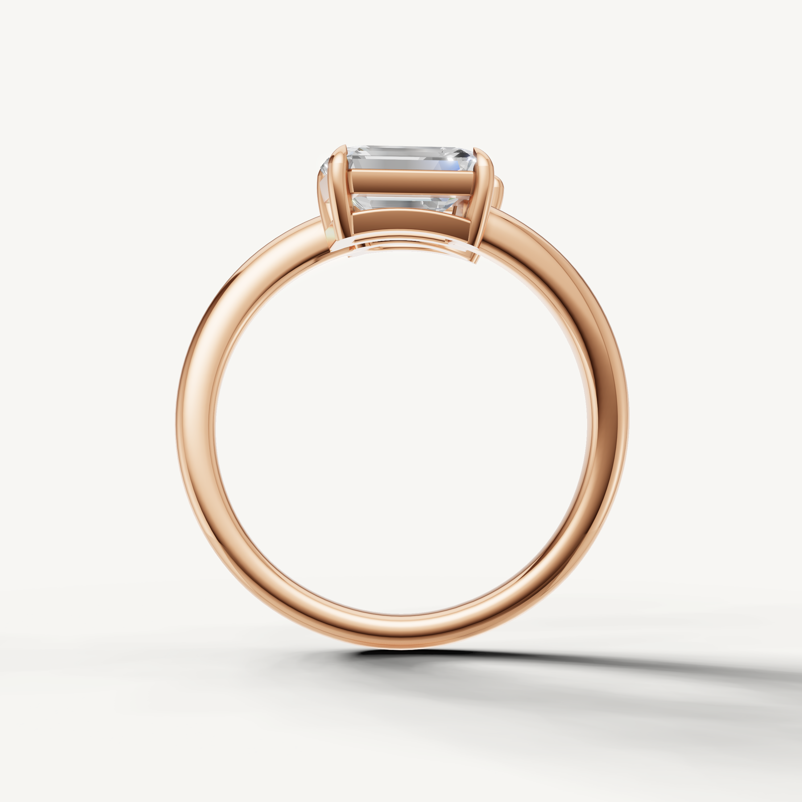 Fine rose gold bypass diamond ring featuring pear and emerald cut stones for women