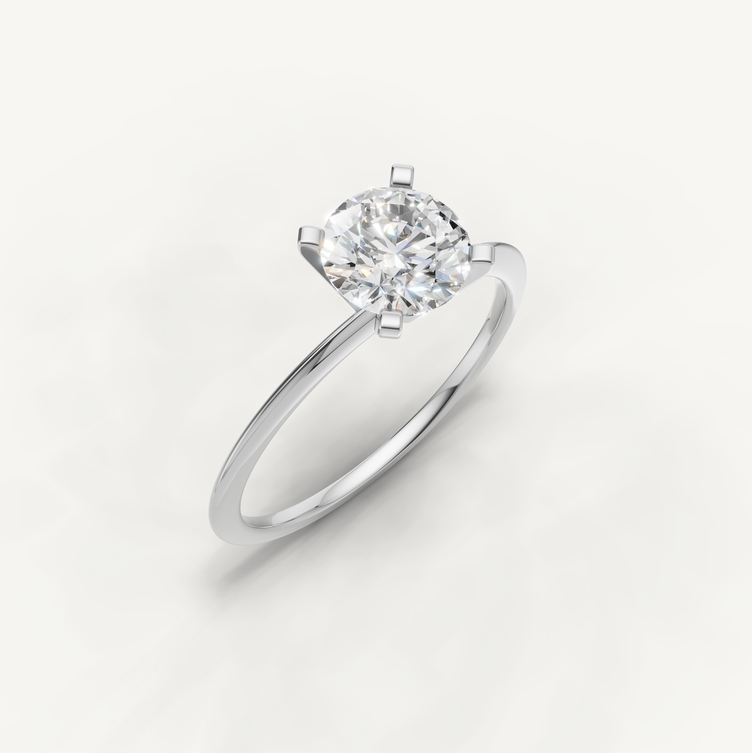 Timeless white gold round brilliant diamond solitaire ring by Raul Diamonds