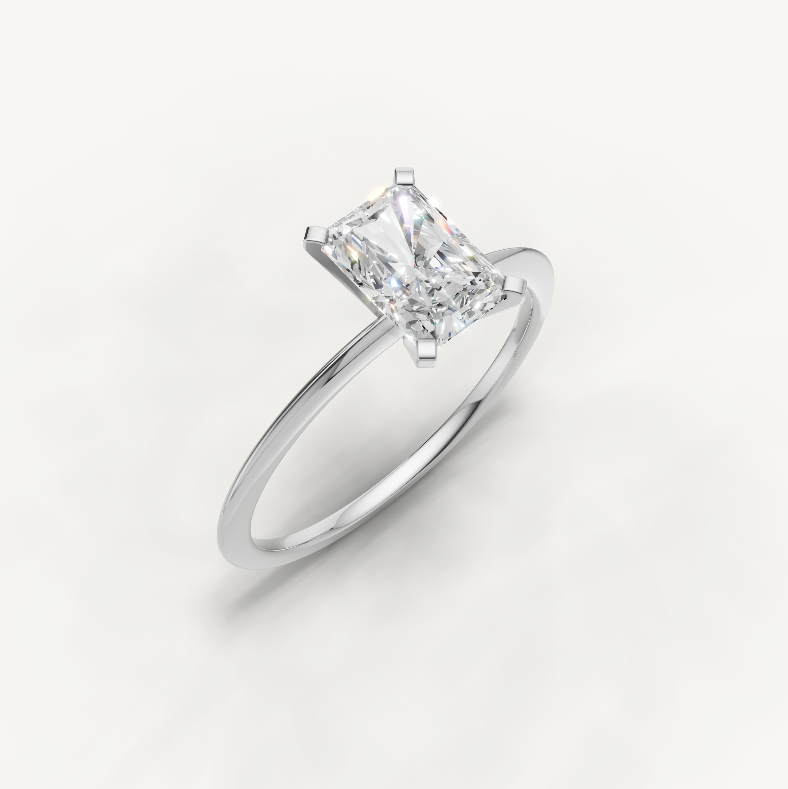 Timeless white gold radiant cut diamond solitaire ring by Raul Diamonds