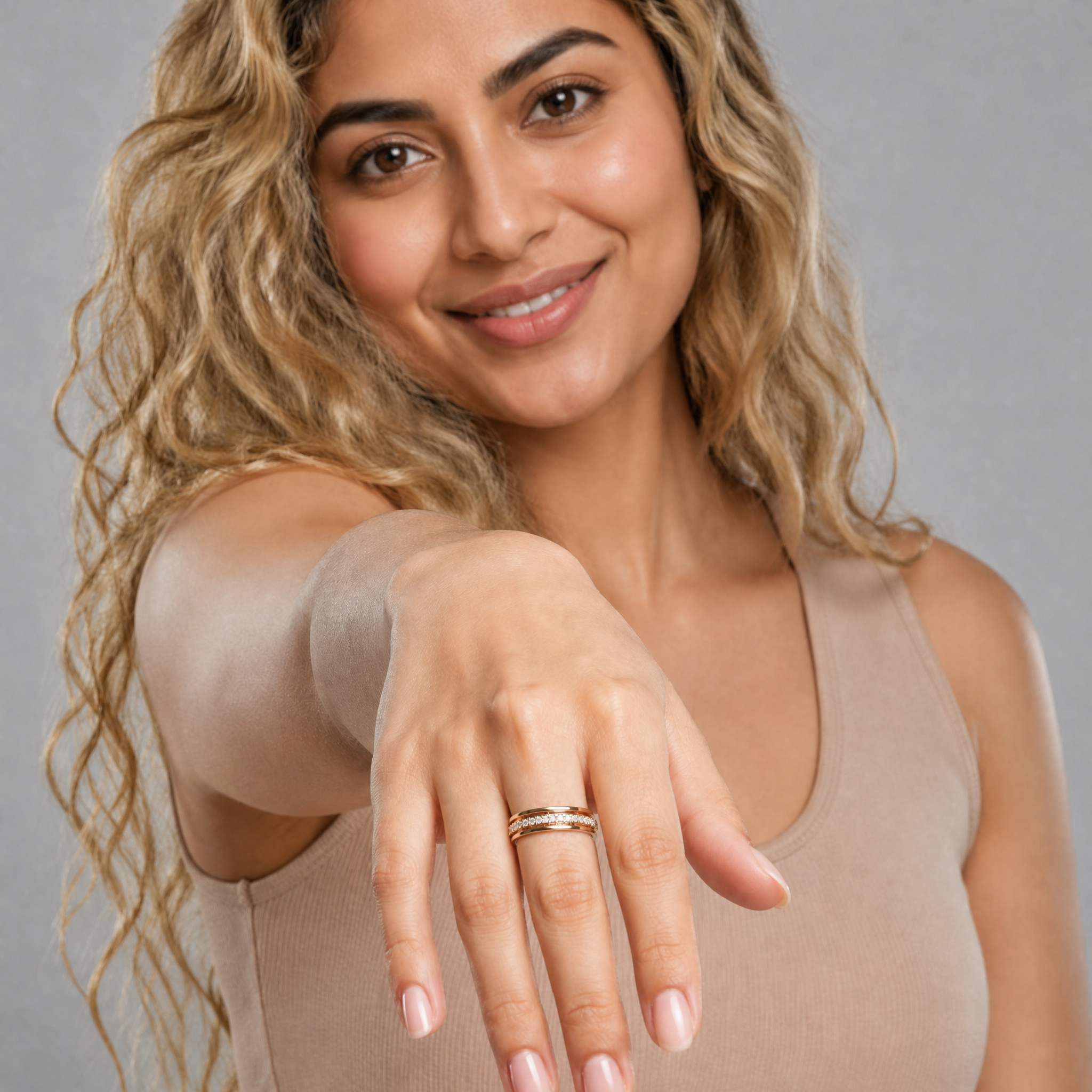 Raul Diamonds model wearing yellow gold channel set diamond wedding band ring for women