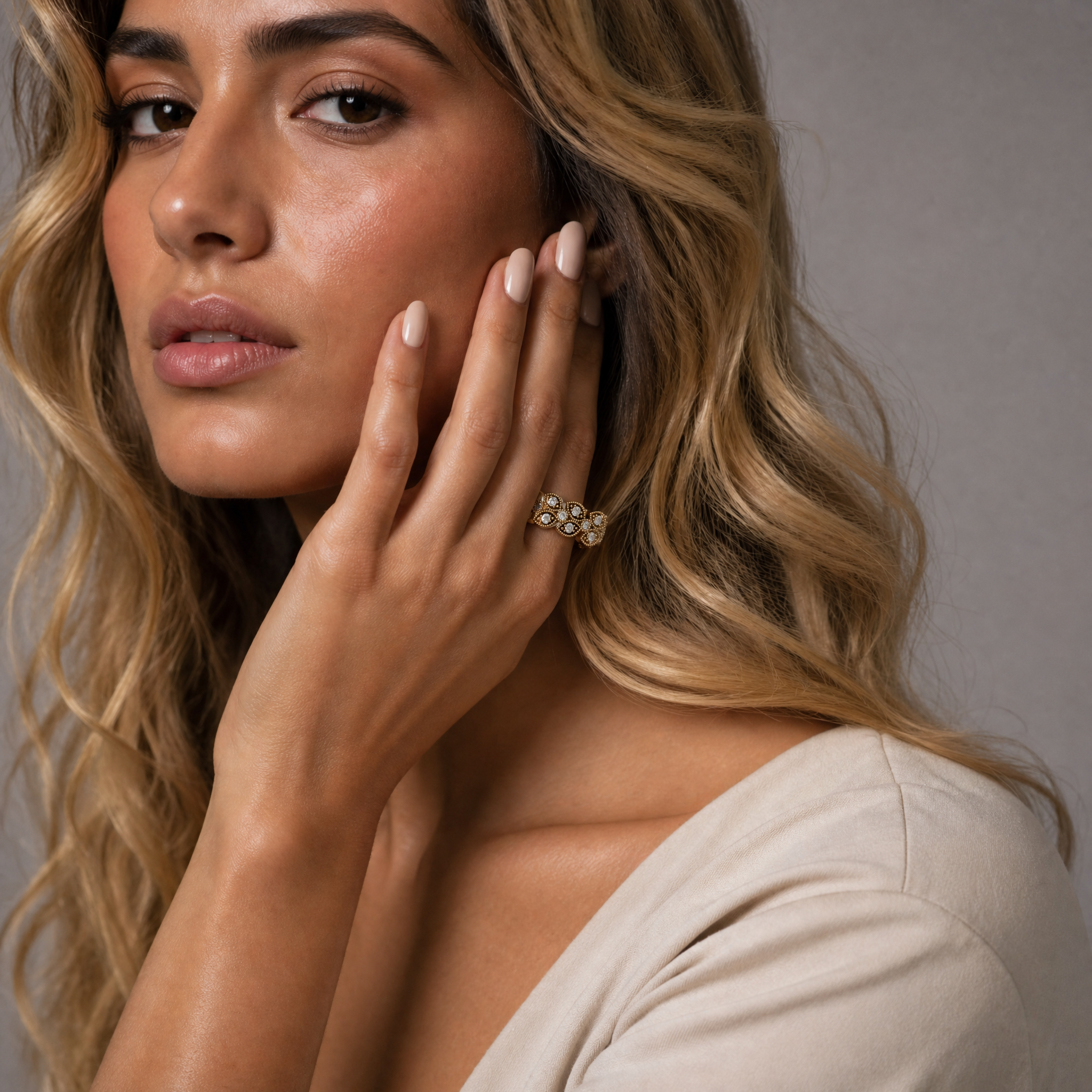 Model wearing Raul Diamonds yellow gold floral inspired lab grown diamond eternity band featuring vintage marquise motifs and elegant milgrain detailing for luxury bridal style