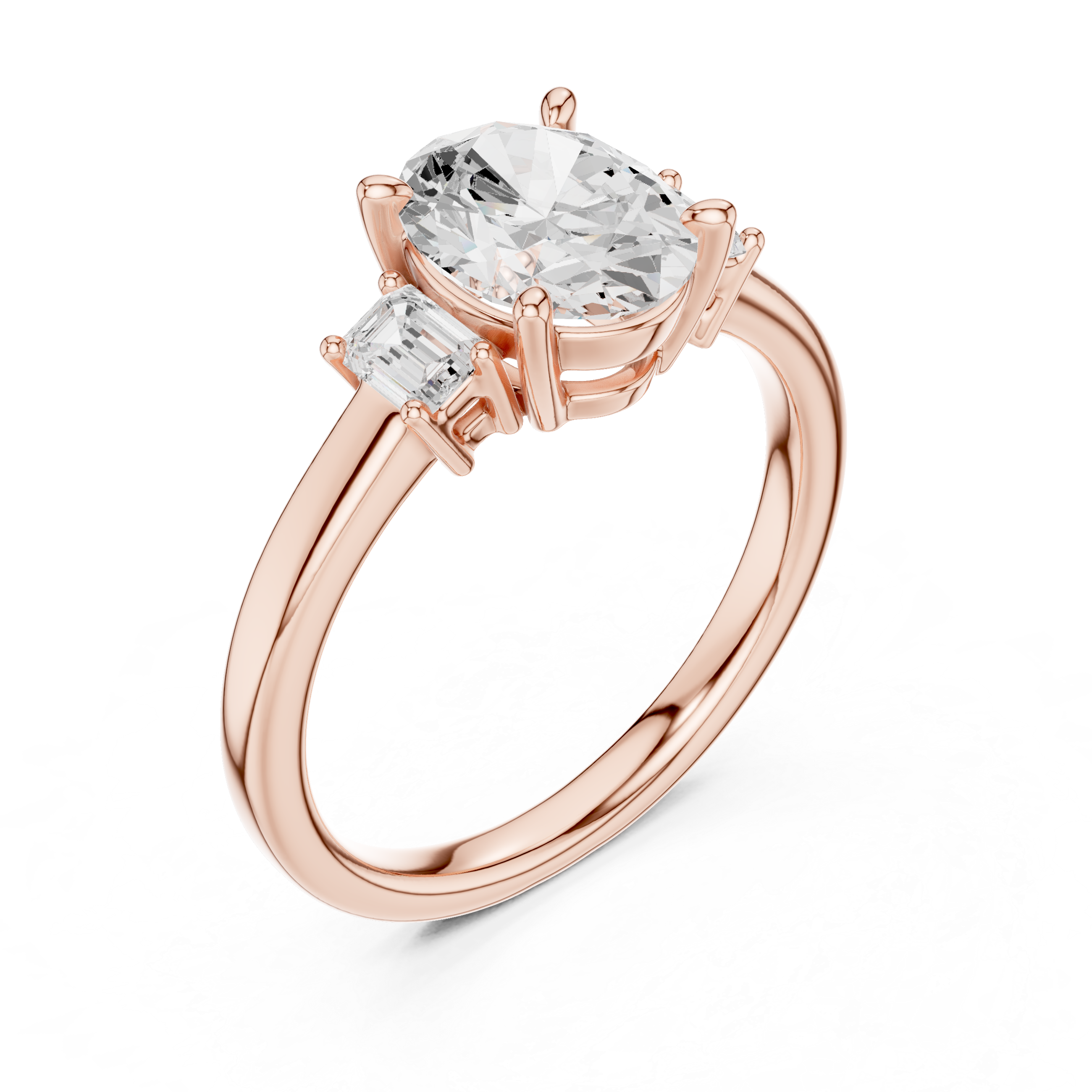 Three-stone lab grown diamond ring with oval center, emeralds