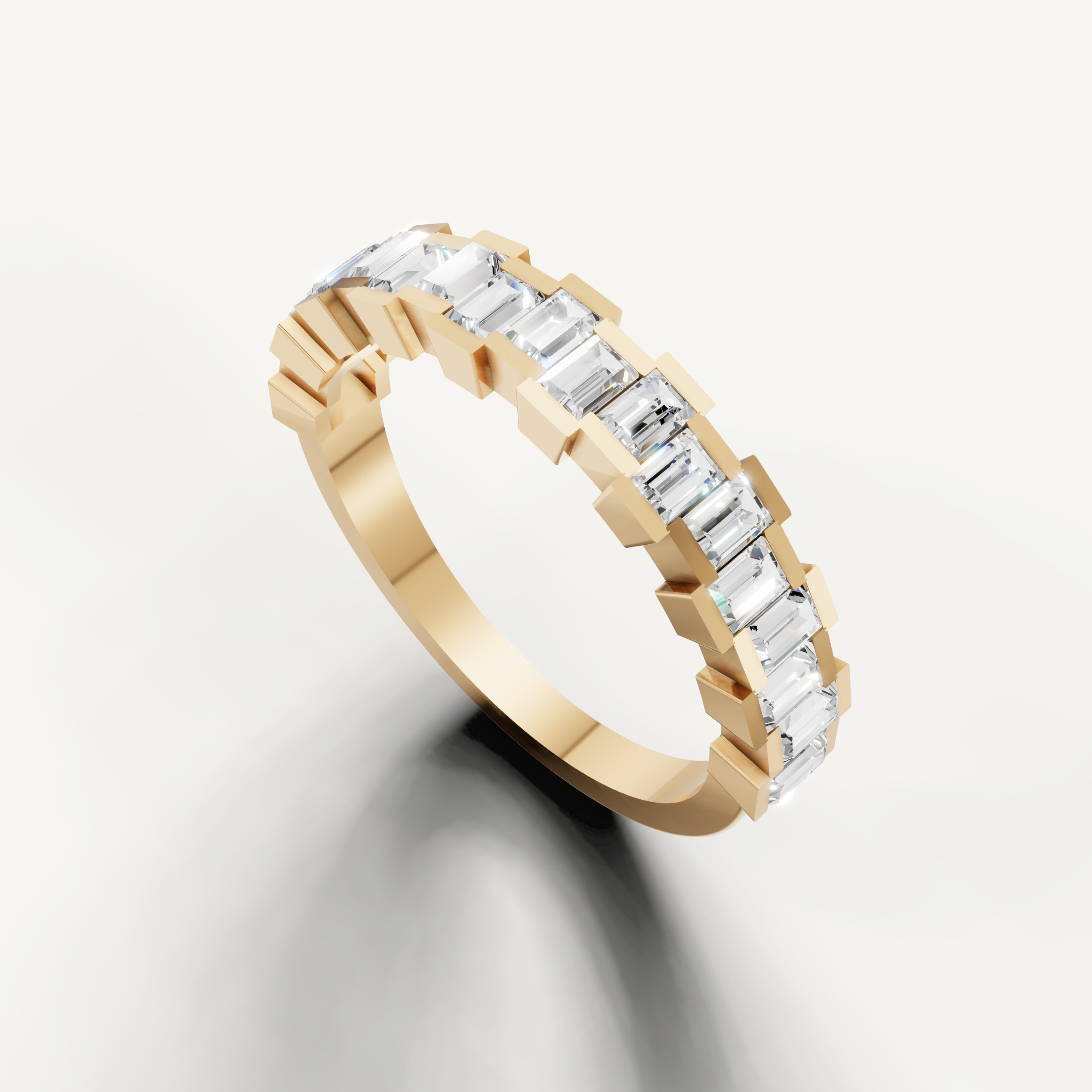 Yellow gold eternity wedding band with emerald cut diamonds by Raul Diamonds