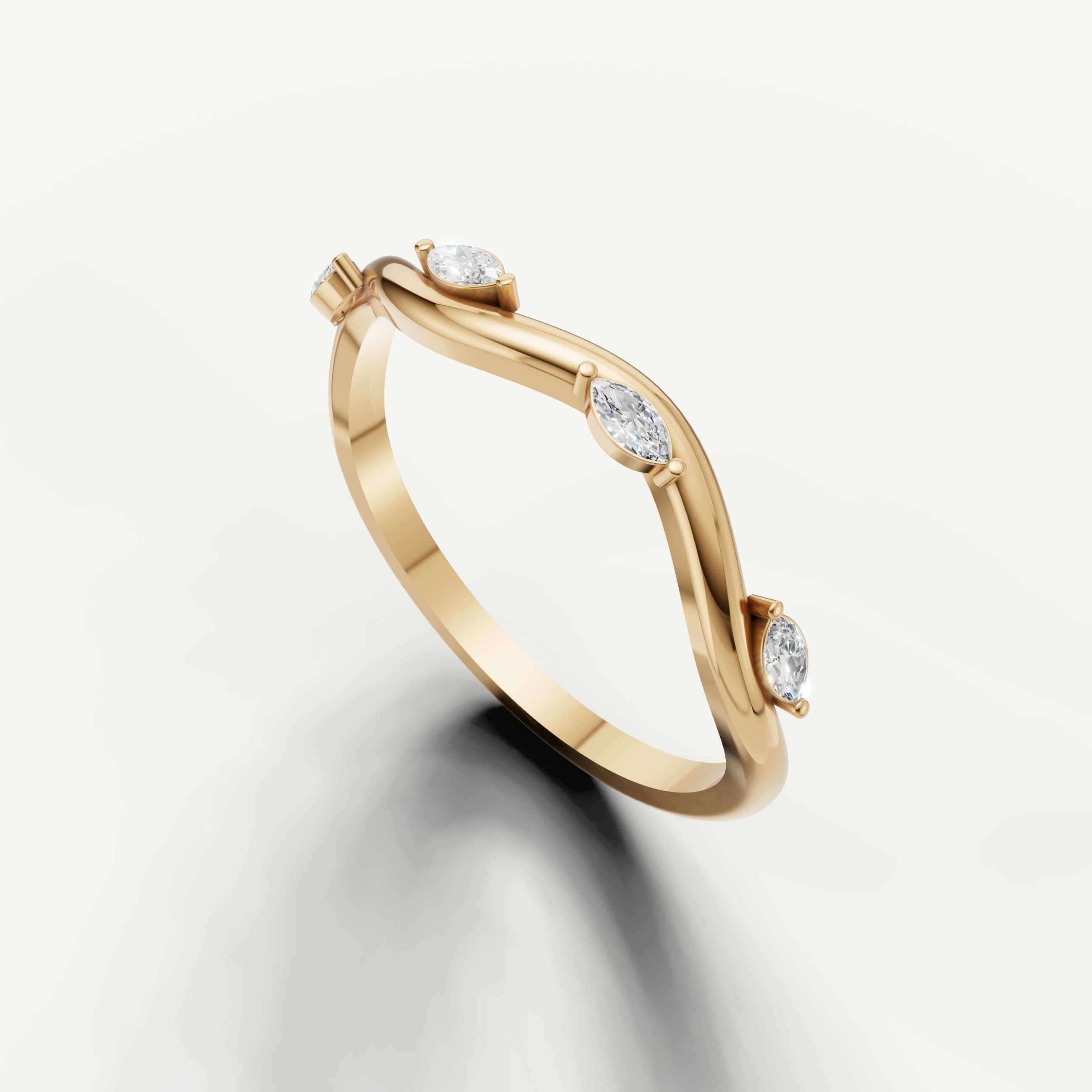 Elegant yellow gold curved wedding band with floating marquise cut diamonds by Raul Diamonds