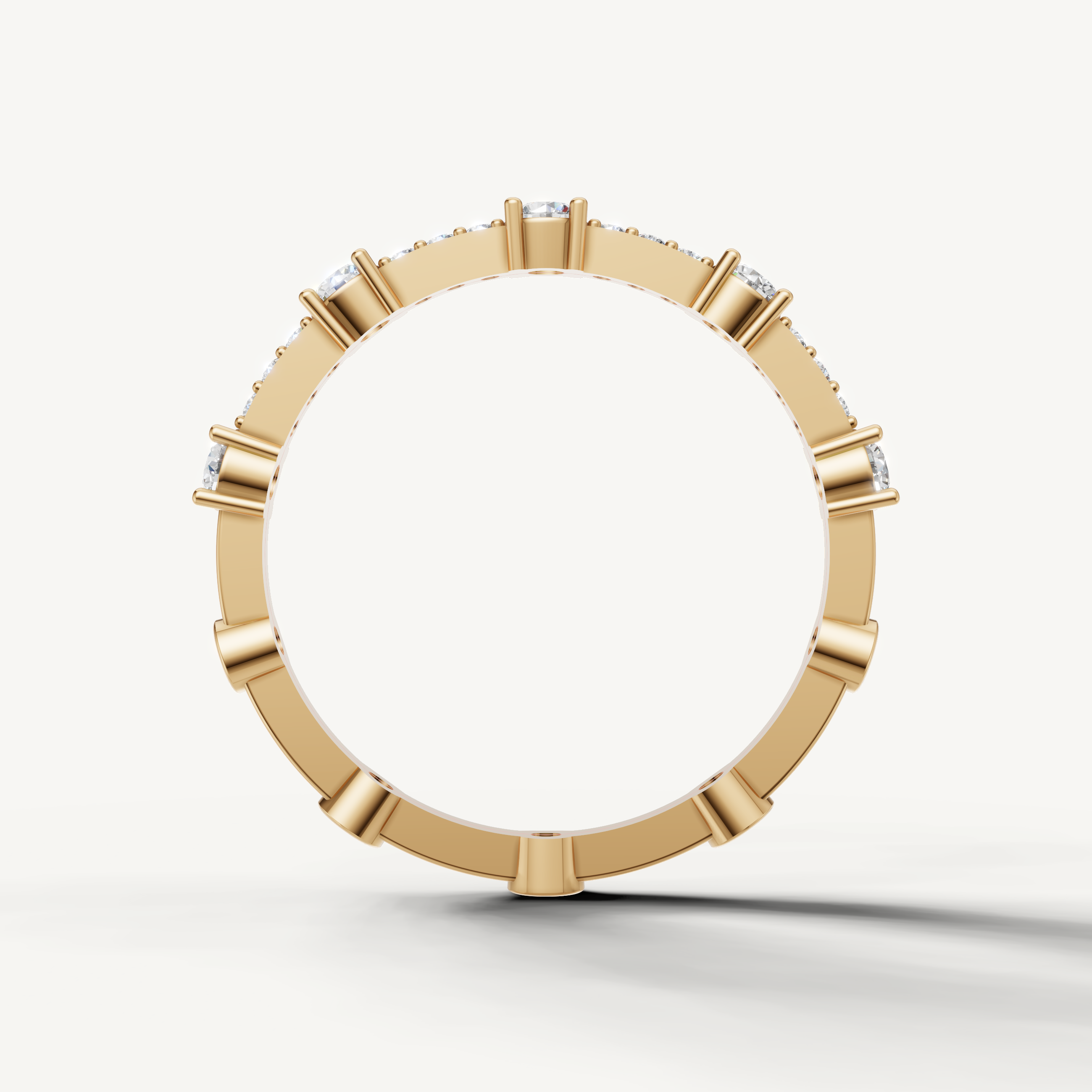 Modern yellow gold diamond wedding band with delicate round brilliant stones