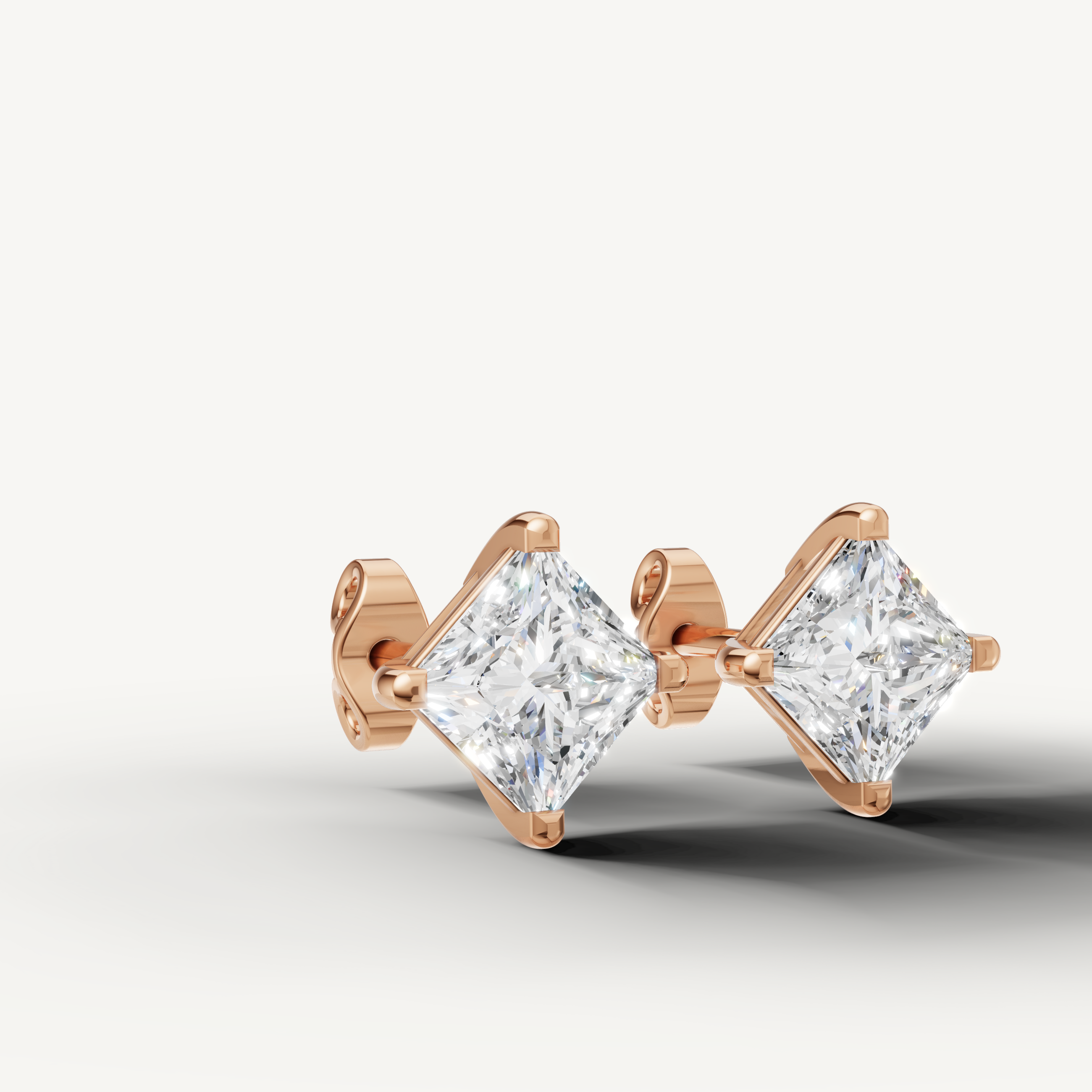 Raul Diamonds rose gold geometric diamond stud earrings for timeless sophistication