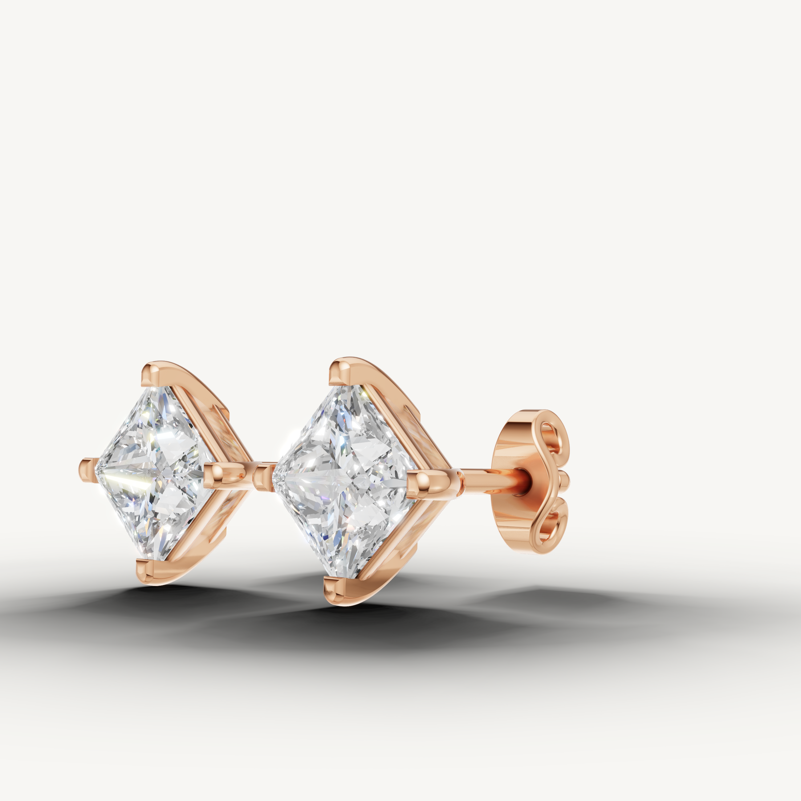 Elegant rose gold princess cut diamond earrings with brilliant shine by Raul Diamonds