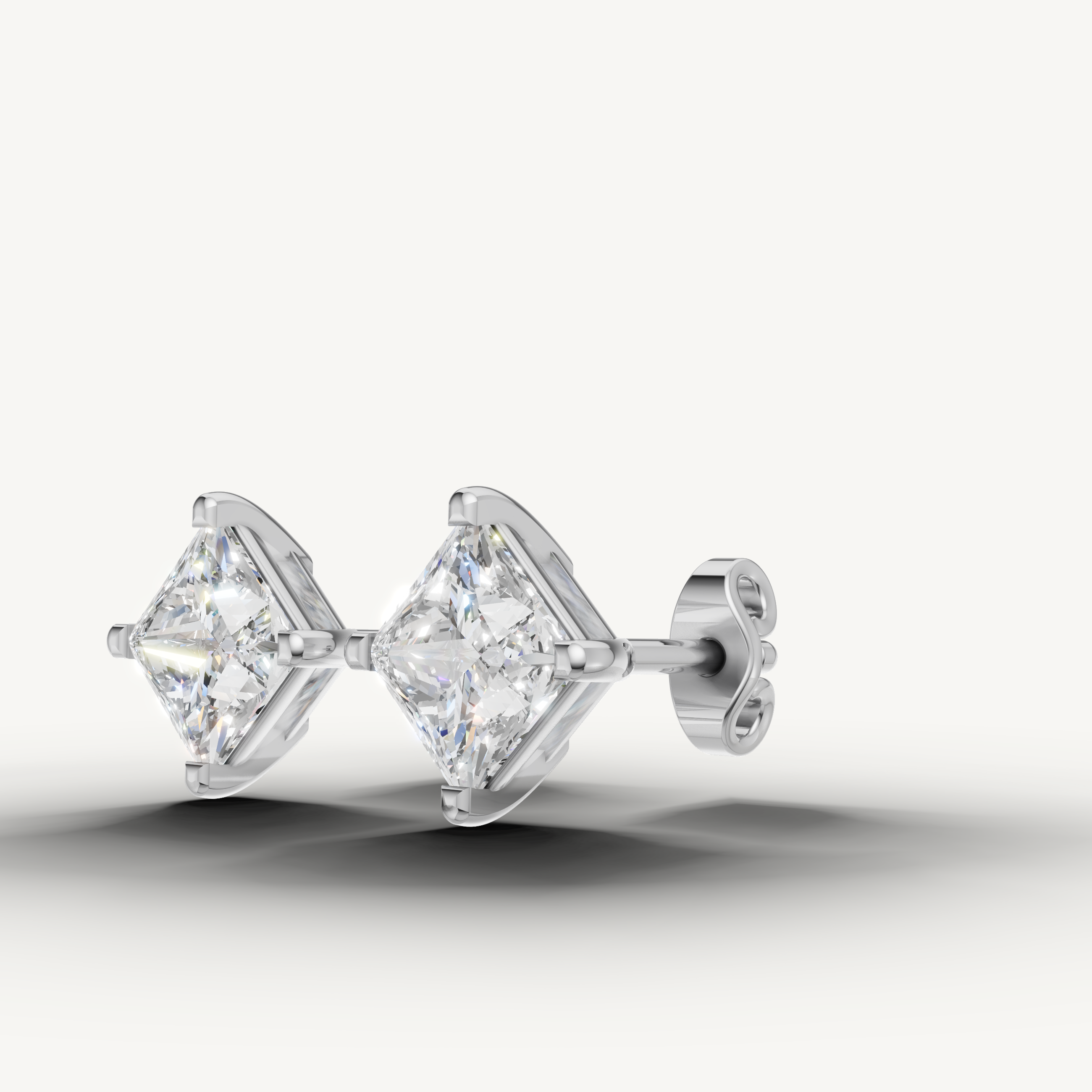 Elegant white gold princess cut diamond earrings with luxury brilliance by Raul Diamonds