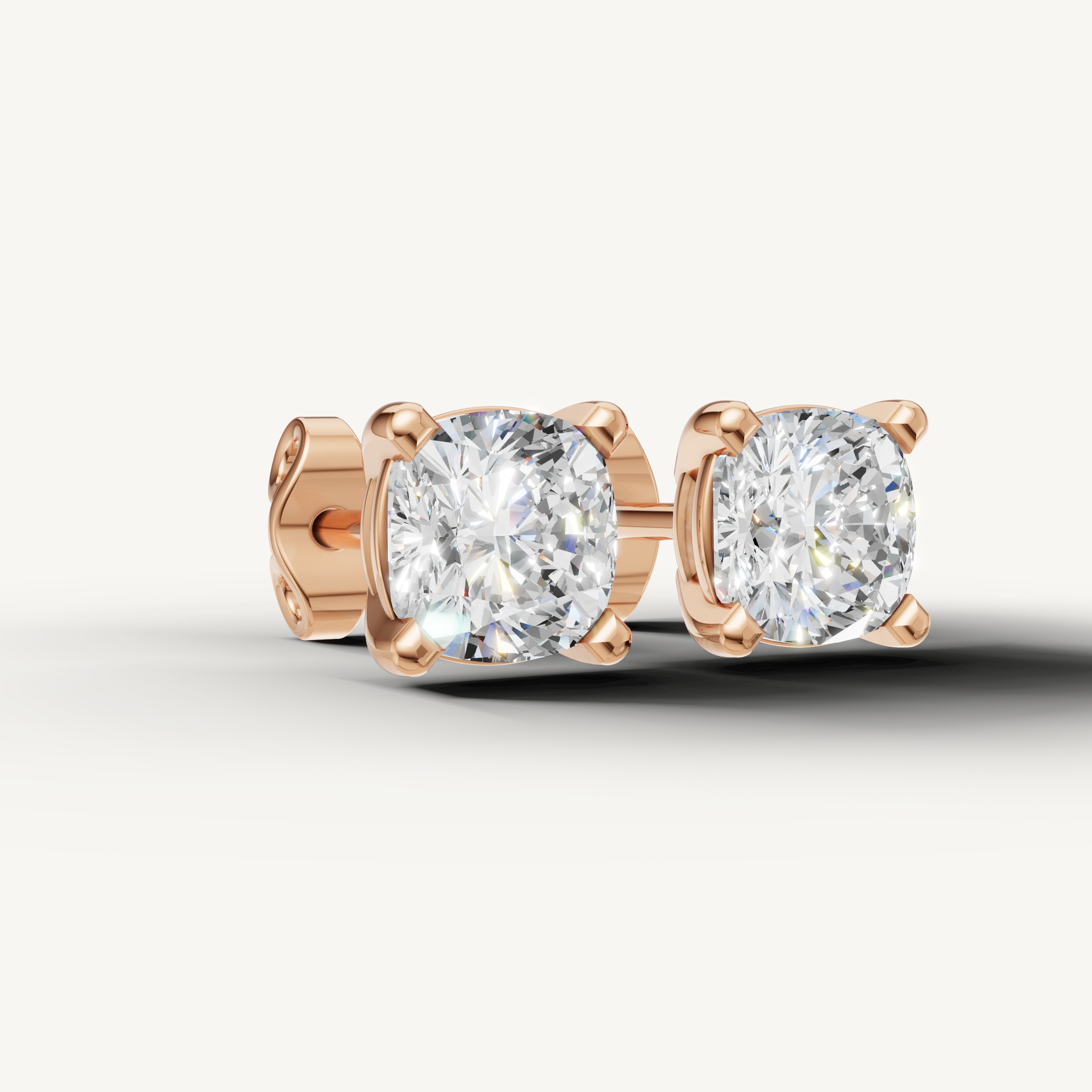 Raul Diamonds rose gold cushion cut diamond stud earrings for sophisticated beauty
