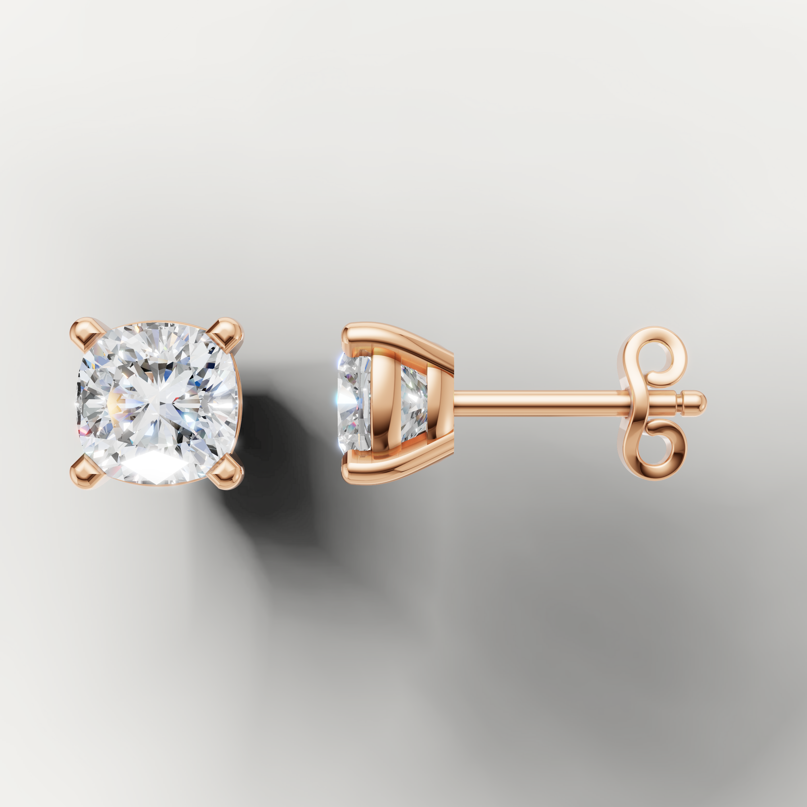 Rose gold solitaire cushion diamond earrings by Raul Diamonds with timeless elegance