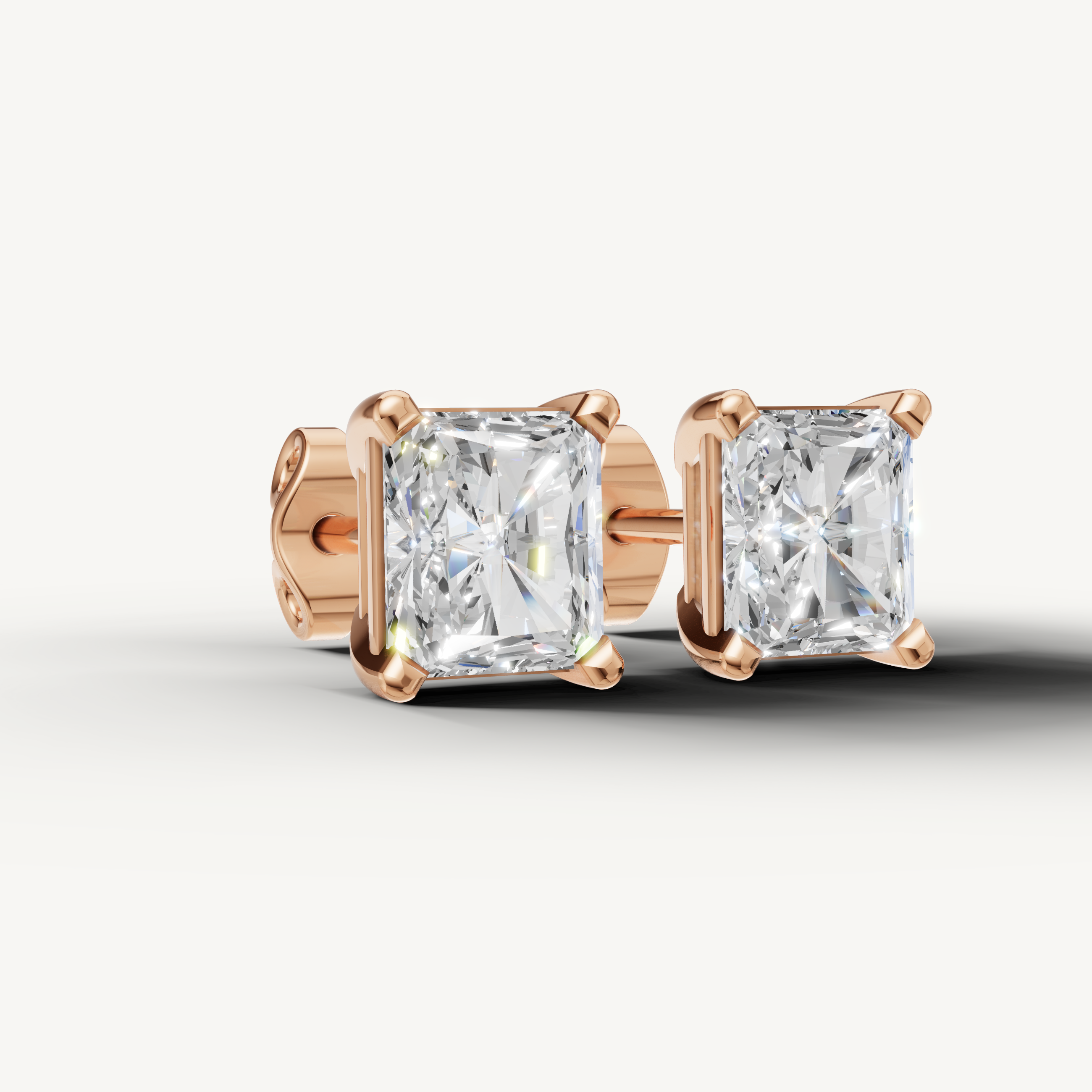 Raul Diamonds rose gold radiant cut diamond earrings for modern luxury jewelry style