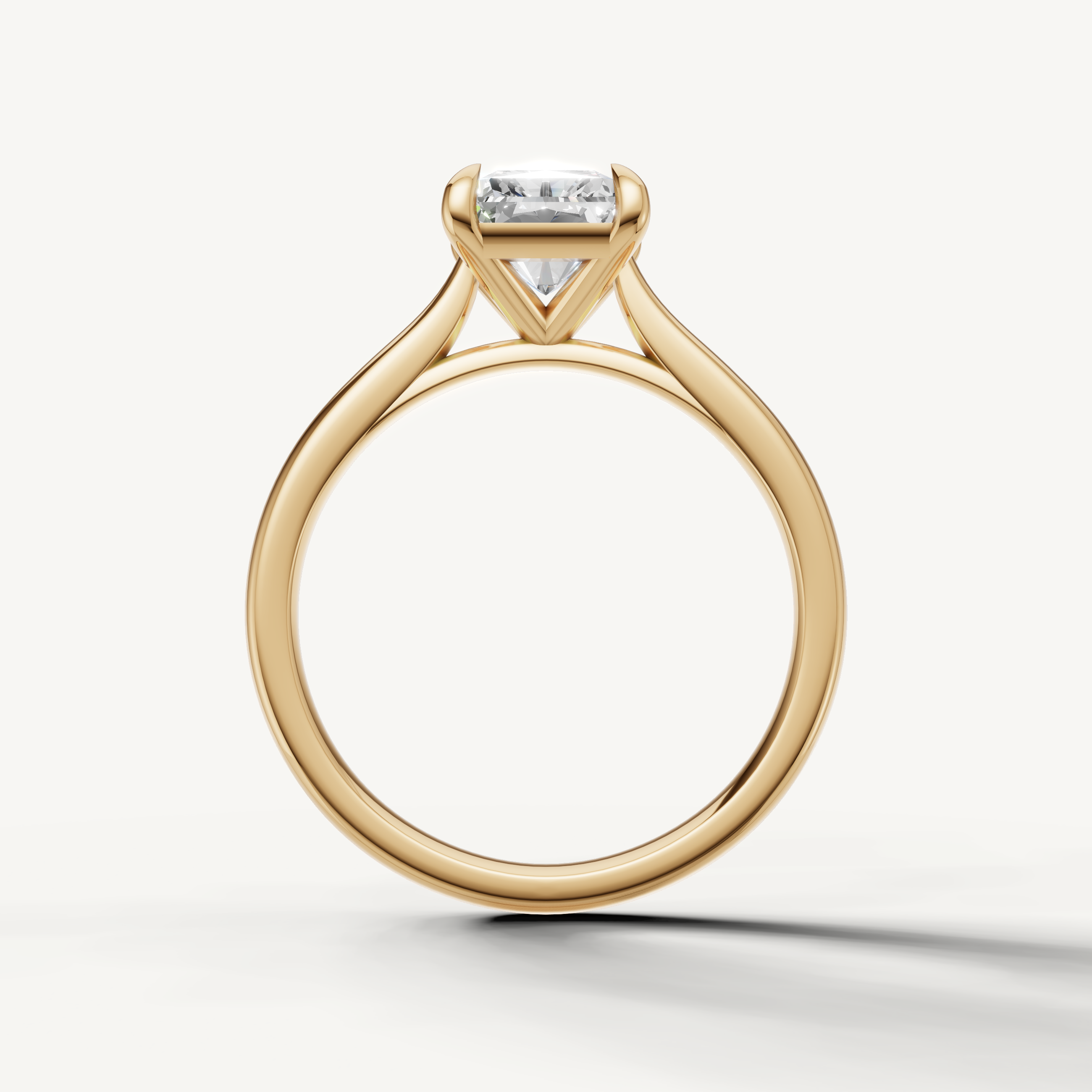 Raul Diamonds handcrafted radiant cut yellow gold engagement ring with minimalist design