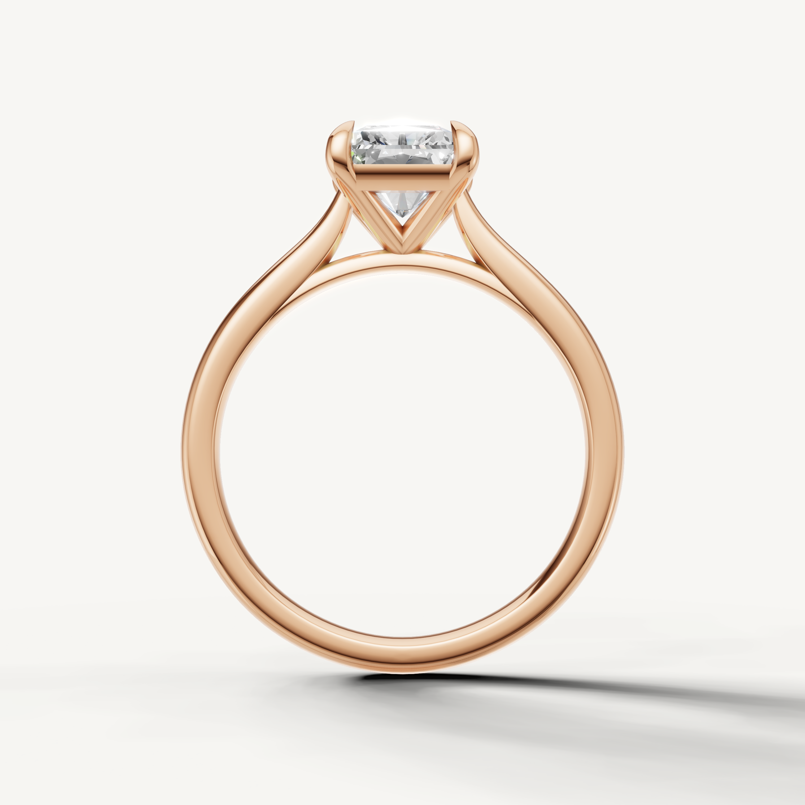 Elegant rose gold radiant solitaire ring with sparkling center diamond by Raul Diamonds