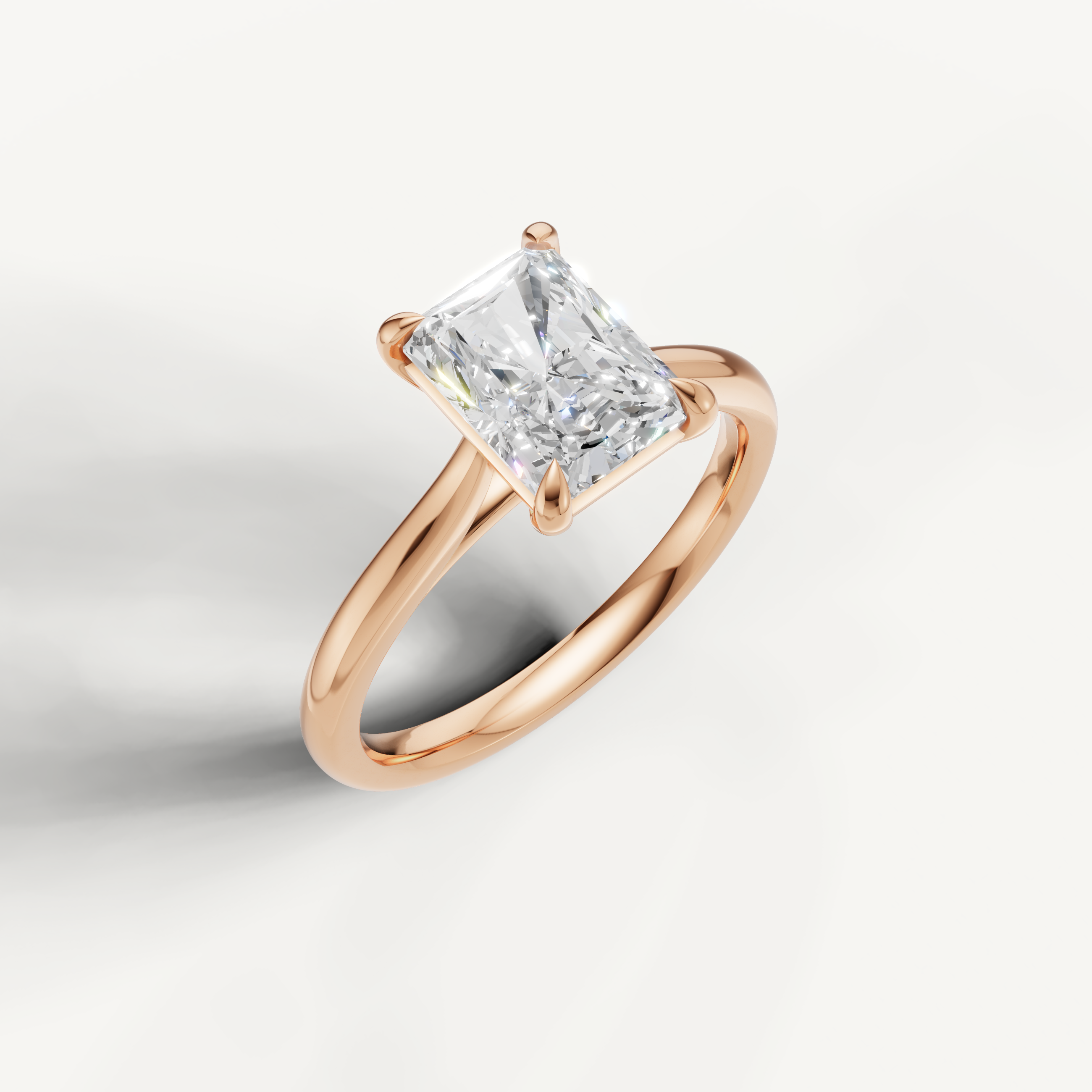 Romantic rose gold radiant diamond ring by Raul Diamonds with polished comfort band
