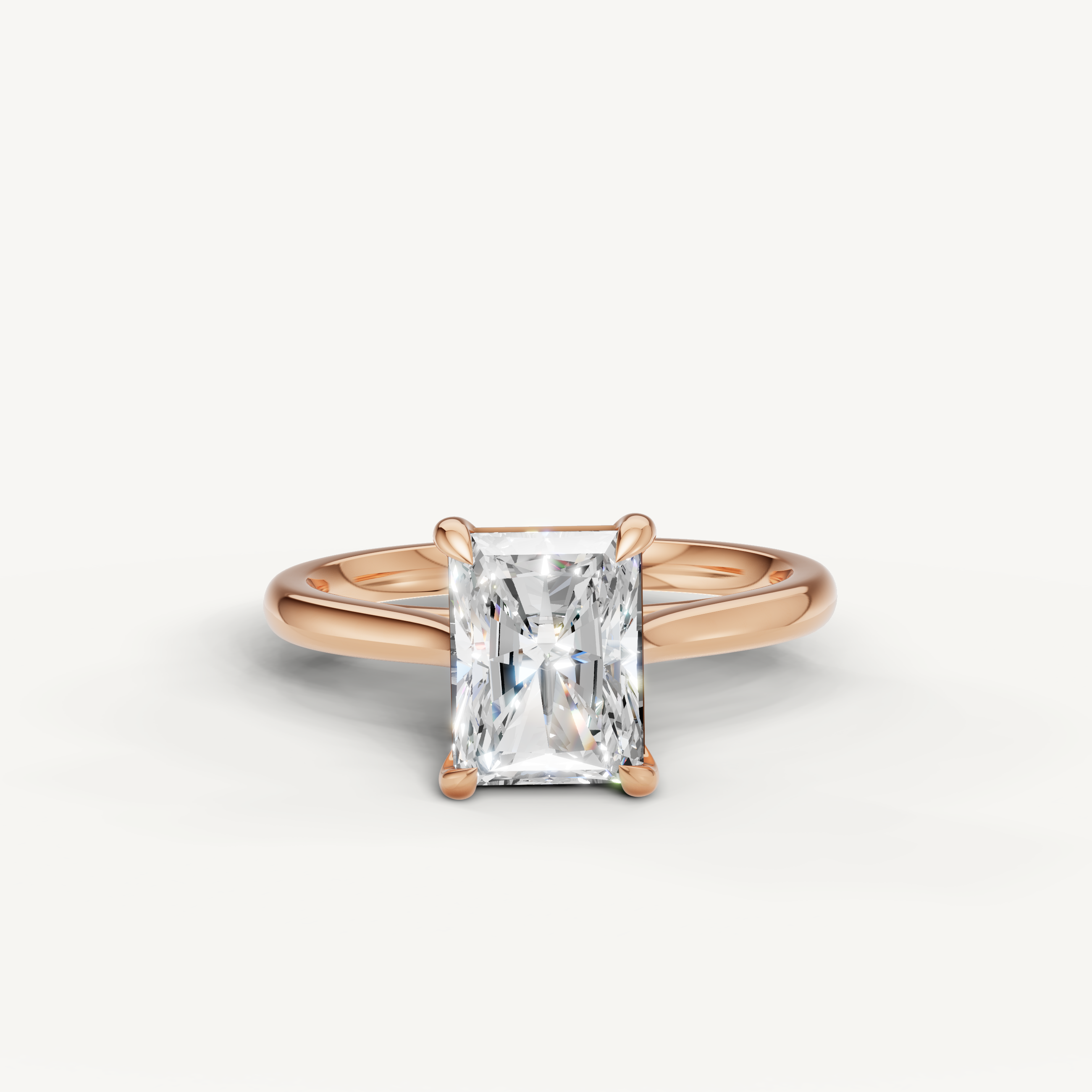 Raul Diamonds radiant cut engagement ring in rose gold with timeless solitaire setting