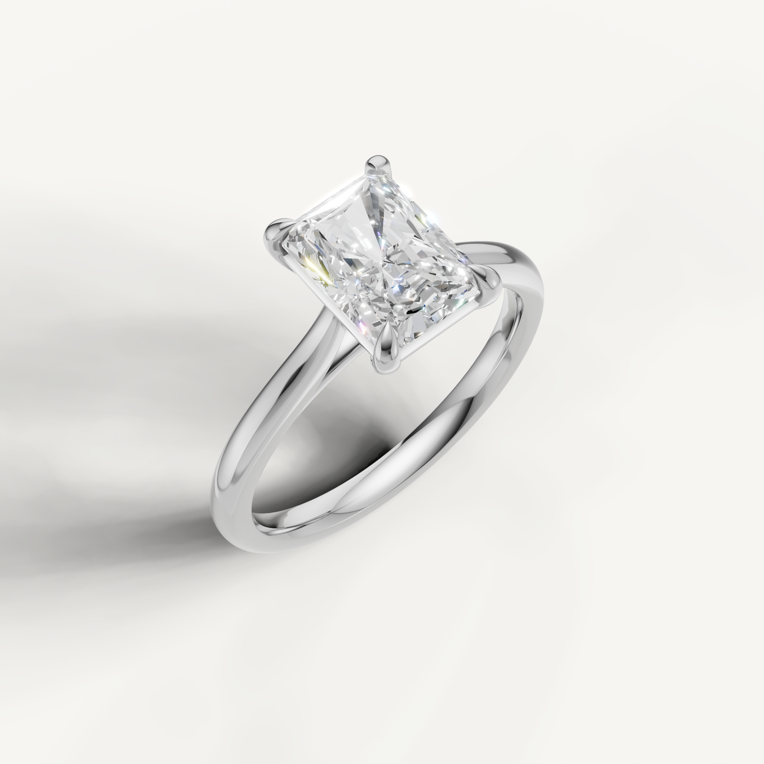 White gold radiant diamond ring by Raul Diamonds with sleek contemporary styling