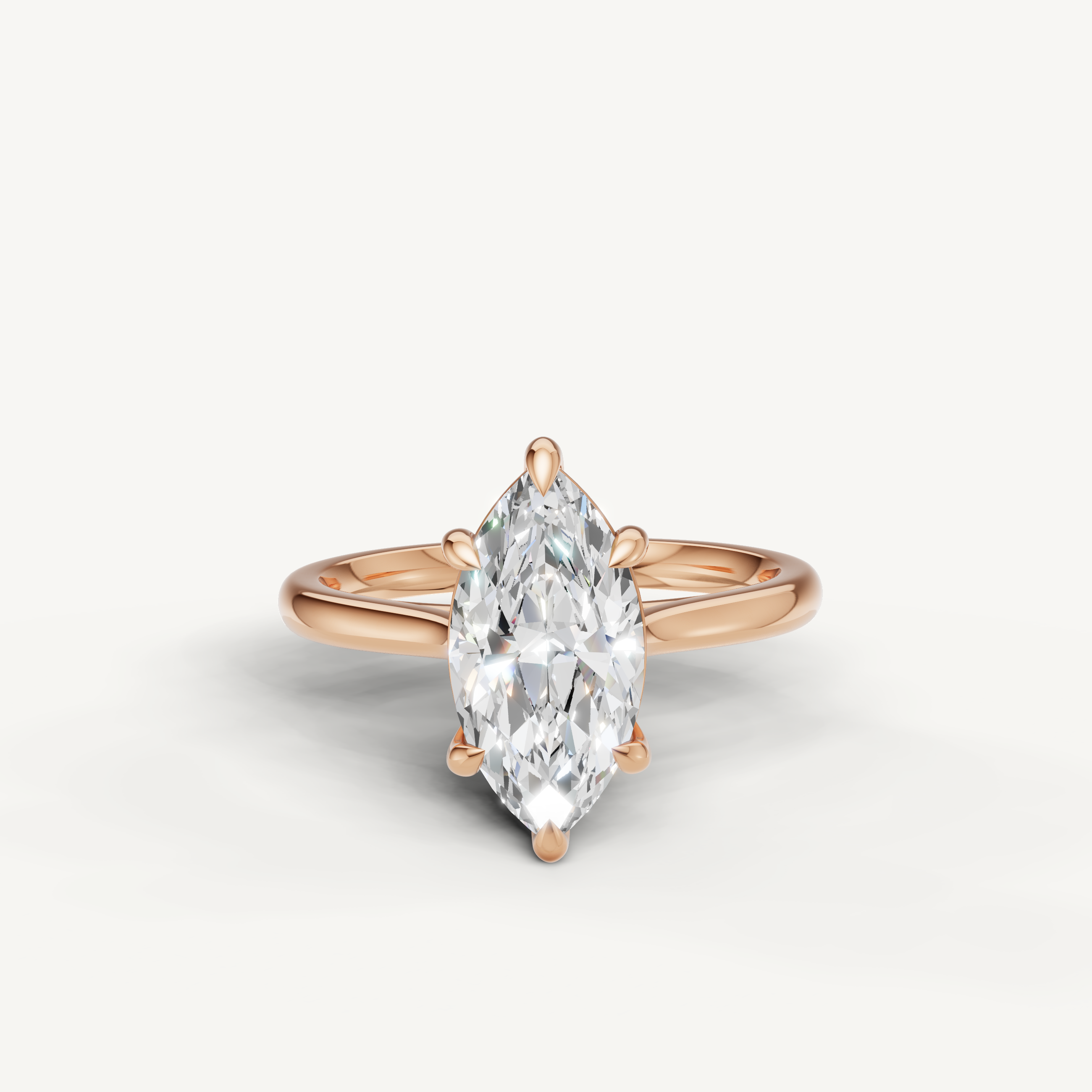Raul Diamonds marquise cut engagement ring in rose gold with modern solitaire design