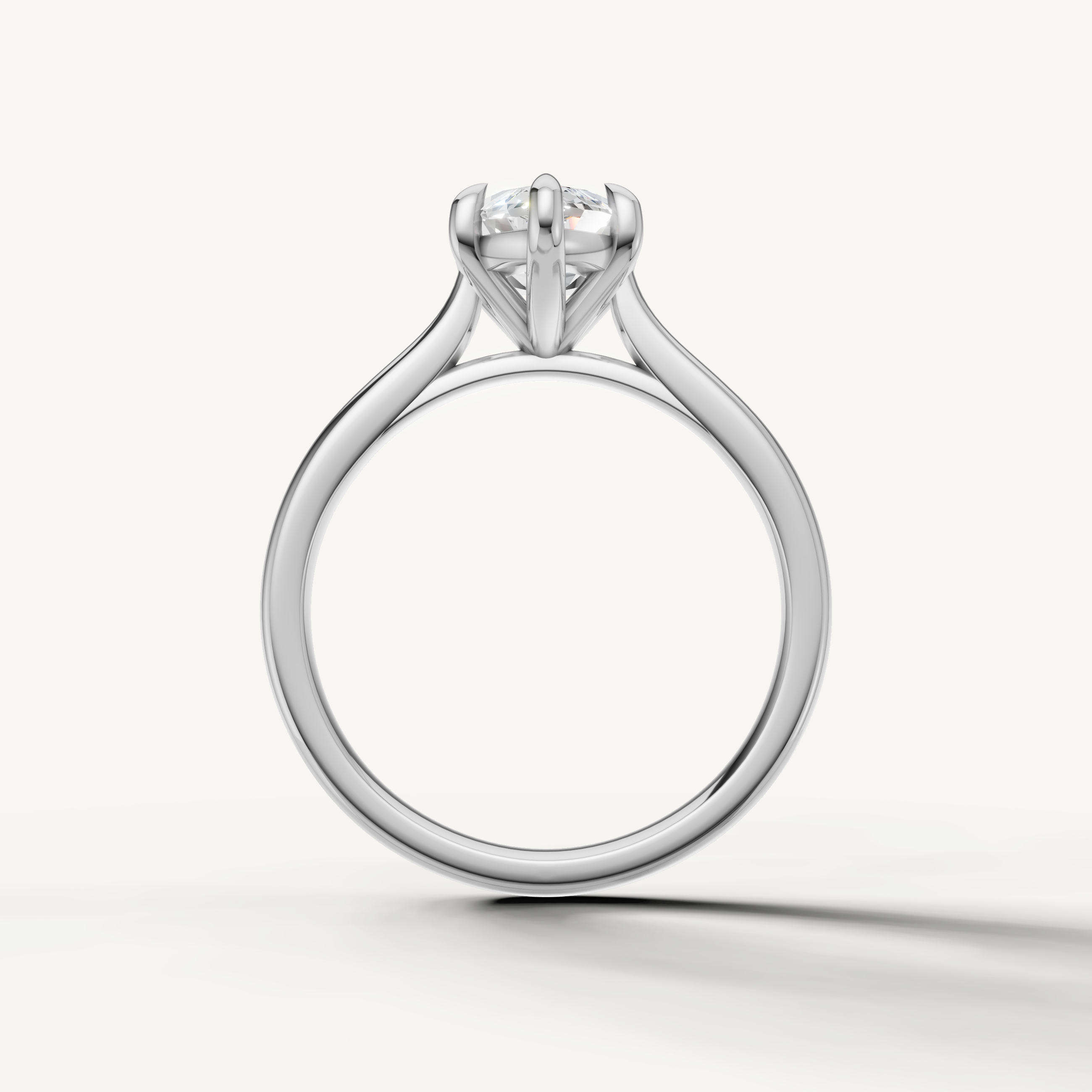 Modern white gold marquise solitaire ring with elongated brilliant diamond by Raul Diamonds