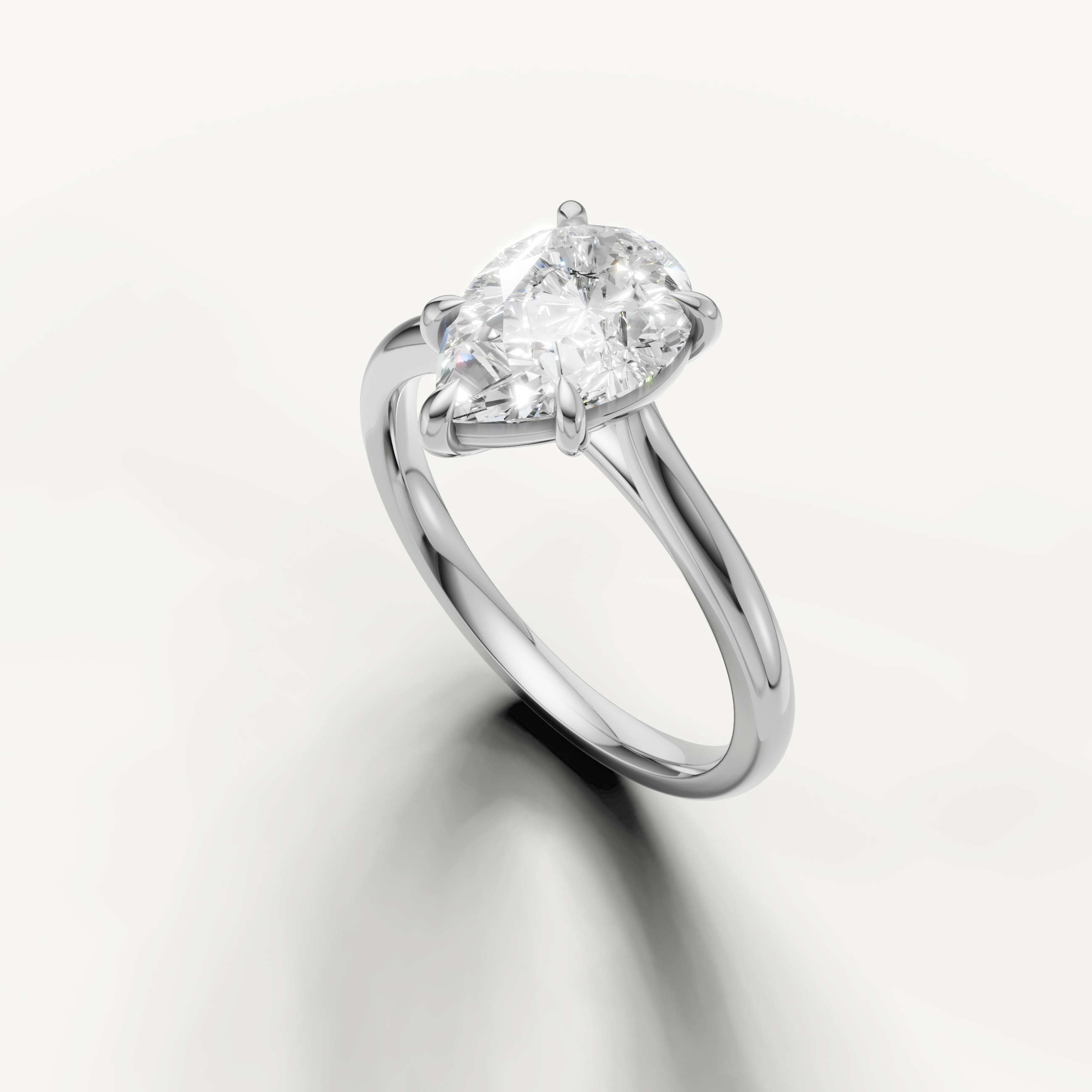 Luxury pear cut white gold engagement ring crafted by Raul Diamonds