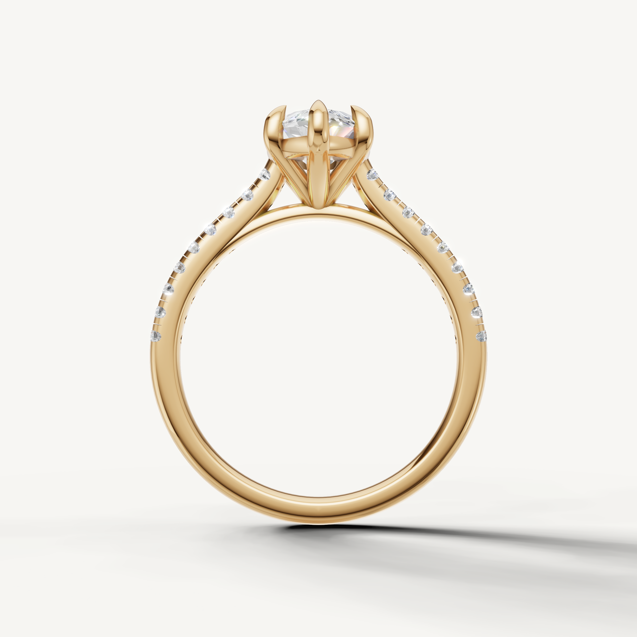 Raul Diamonds handcrafted marquise engagement ring in yellow gold with diamond accented band