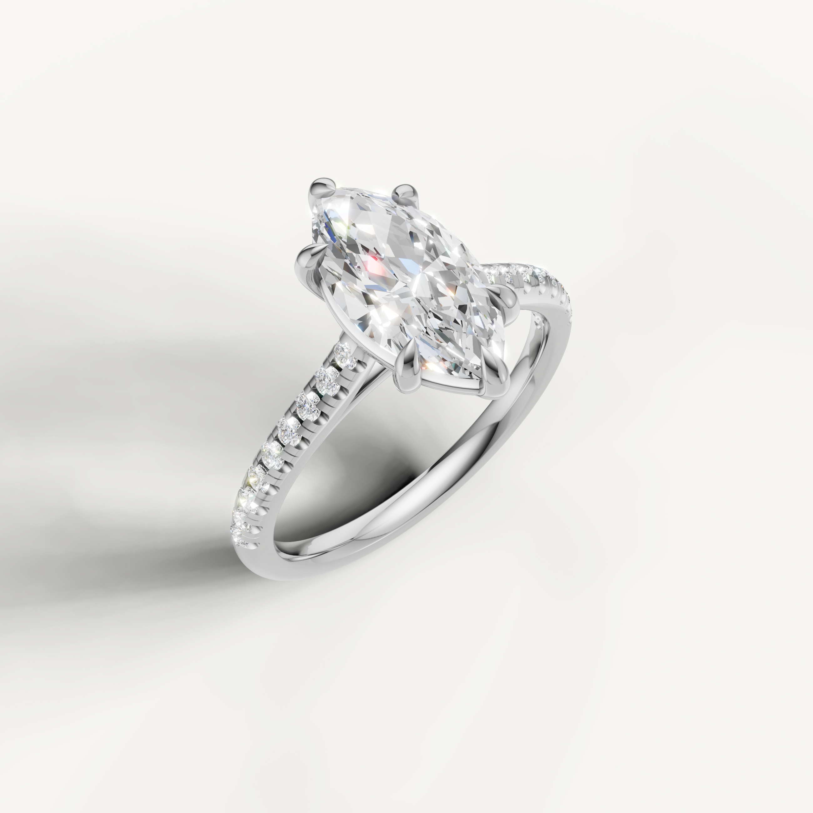 White gold marquise diamond ring by Raul Diamonds with sparkling side stones