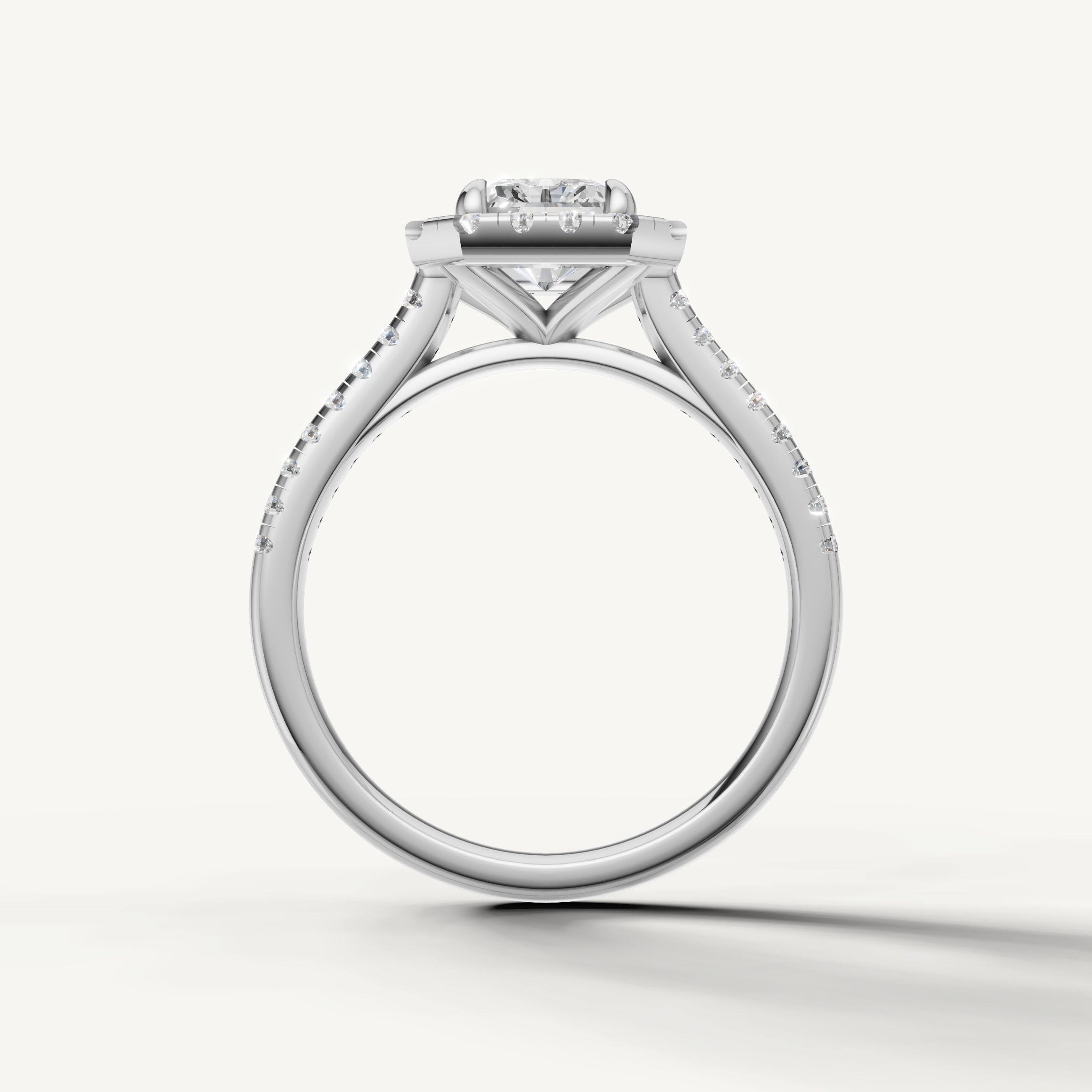 Luxury radiant halo solitaire diamond ring in white gold handcrafted by Raul Diamonds