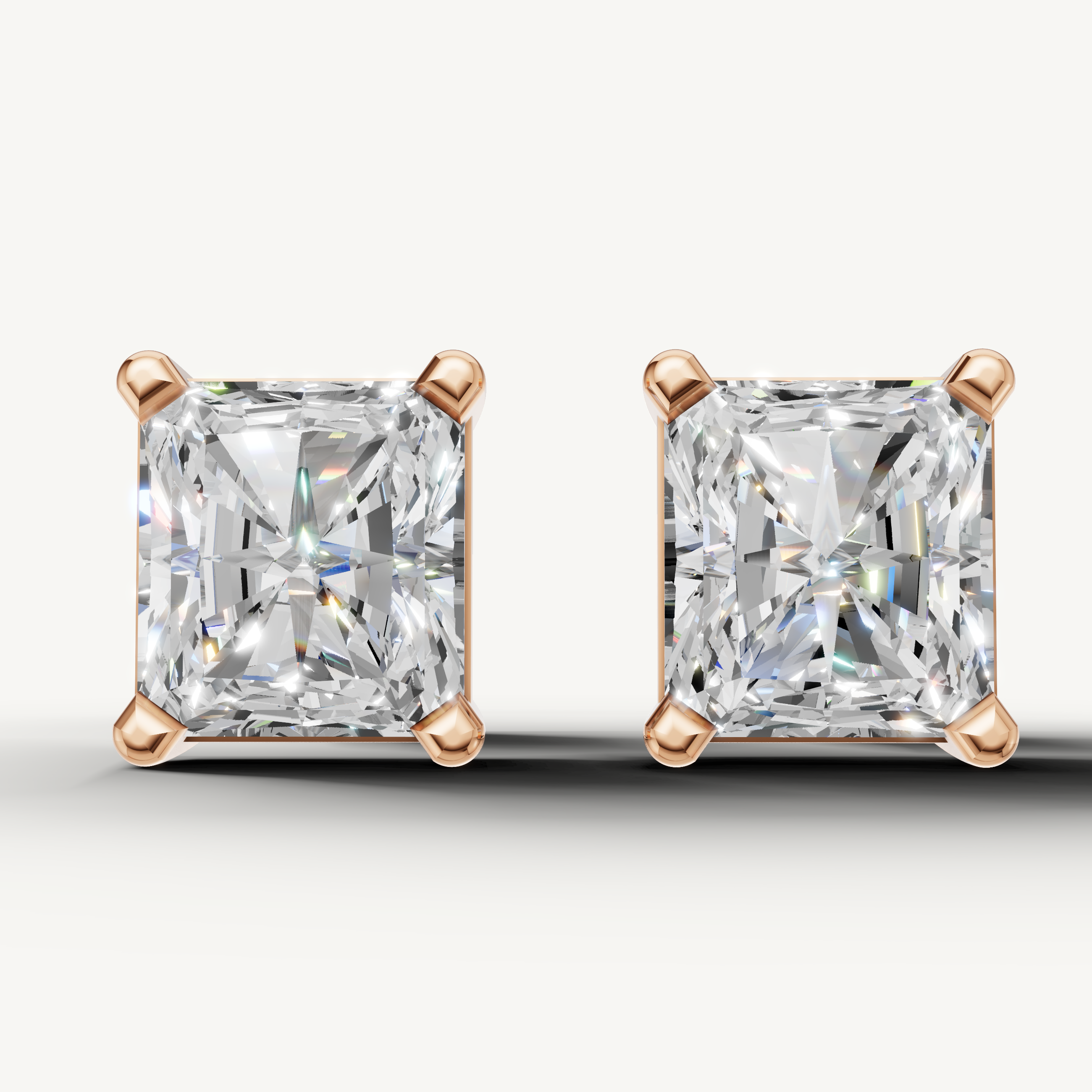 Radiant cut lab grown diamond stud earrings in 14K rose gold by Raul Diamonds