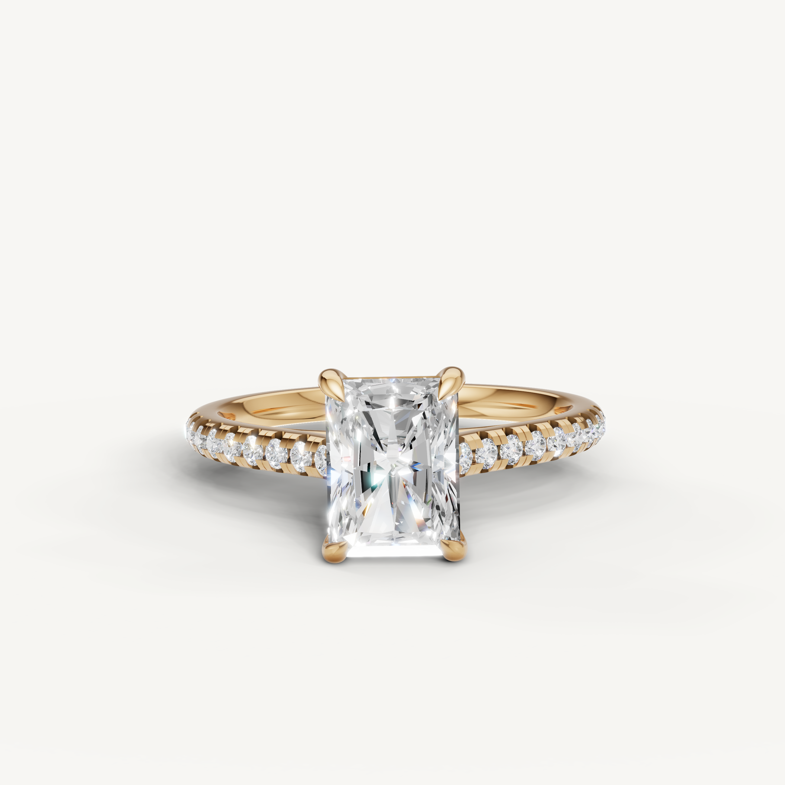 Raul Diamonds radiant cut engagement ring in yellow gold with pavé diamond band