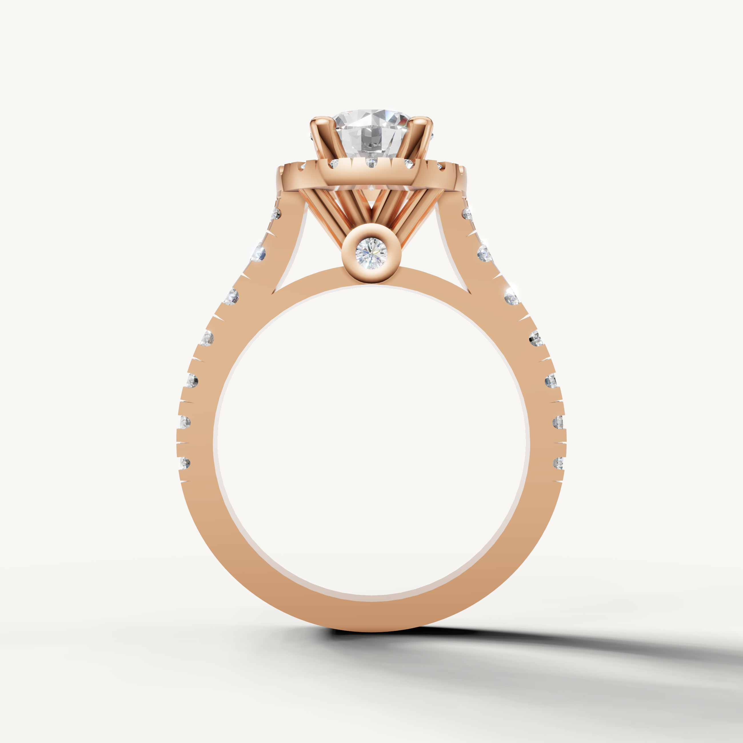 Brilliant Seo rose gold halo diamond ring with detailed pavé setting by Raul Diamonds.