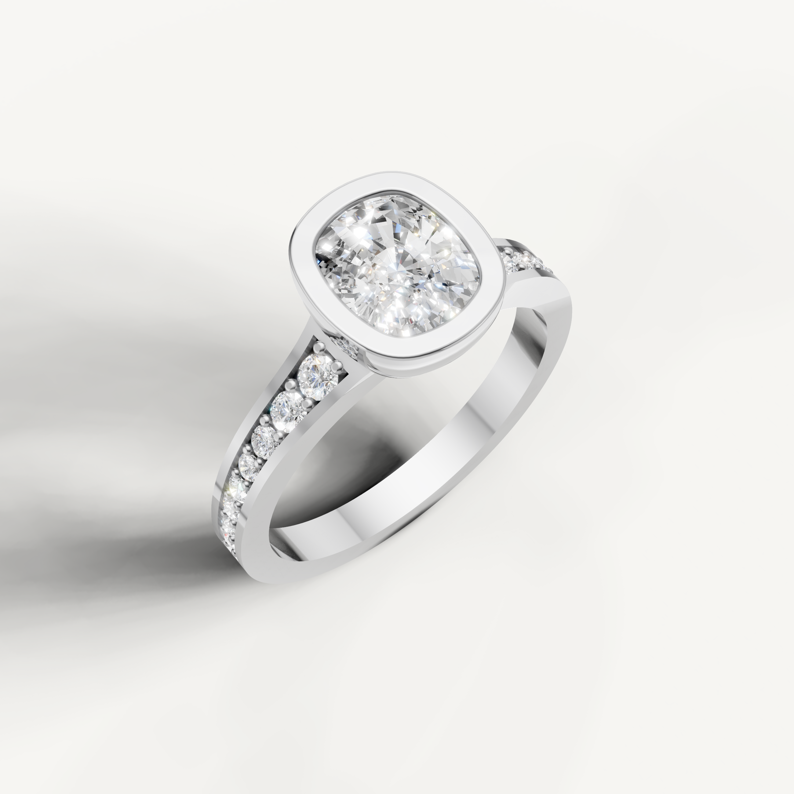 Timeless Seo yellow gold bezel diamond ring with cushion center stone by Raul Diamonds.