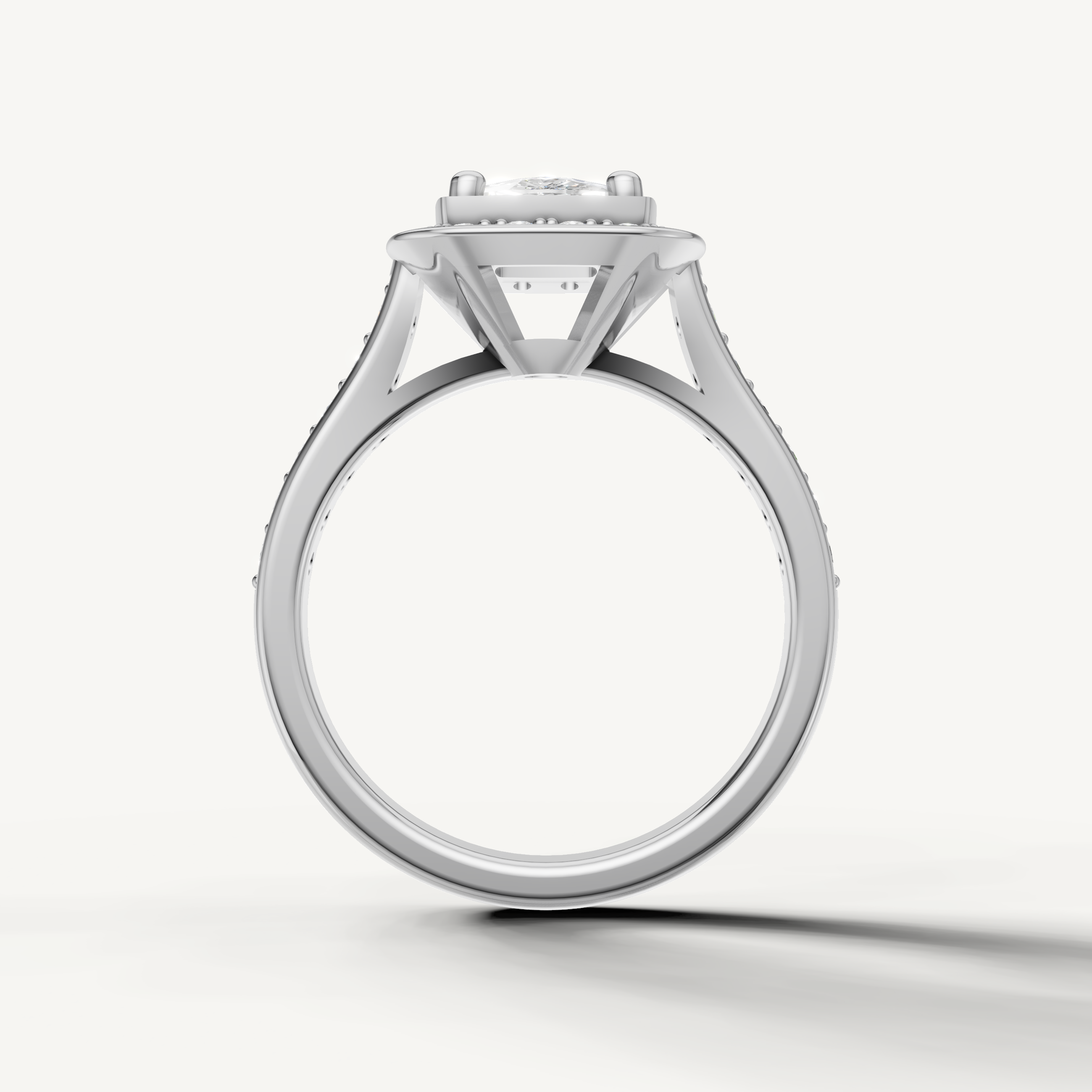 Timeless Seo white gold round halo diamond engagement ring from Raul Diamonds.
